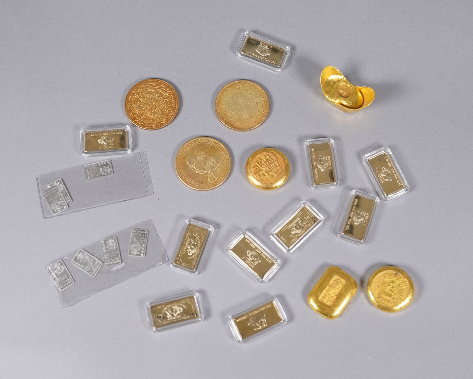 Lots Chinese ingots ungraded: Lots Chinese ingots ungraded. We do not guarantee its age, material, engraving, carvings or any type of grading. All sales are final, condition selling it as is. No return.