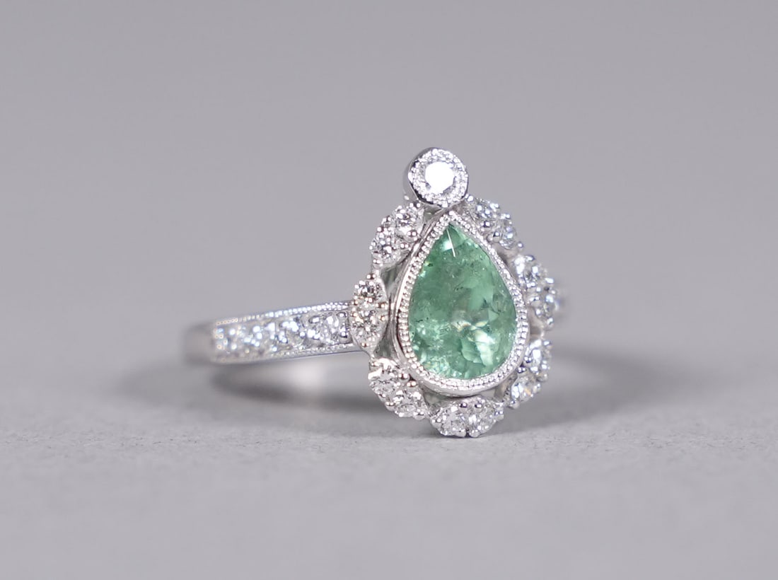 Platinum natural Paraiba tourmaline diamond ring US ring size 6.75: Platinum natural Paraiba tourmaline and diamond ring. Comes with GIA certificate. US ring size 6.75. Total 1.32 carats natural tourmaline, and total 0.45 carats natural diamonds.