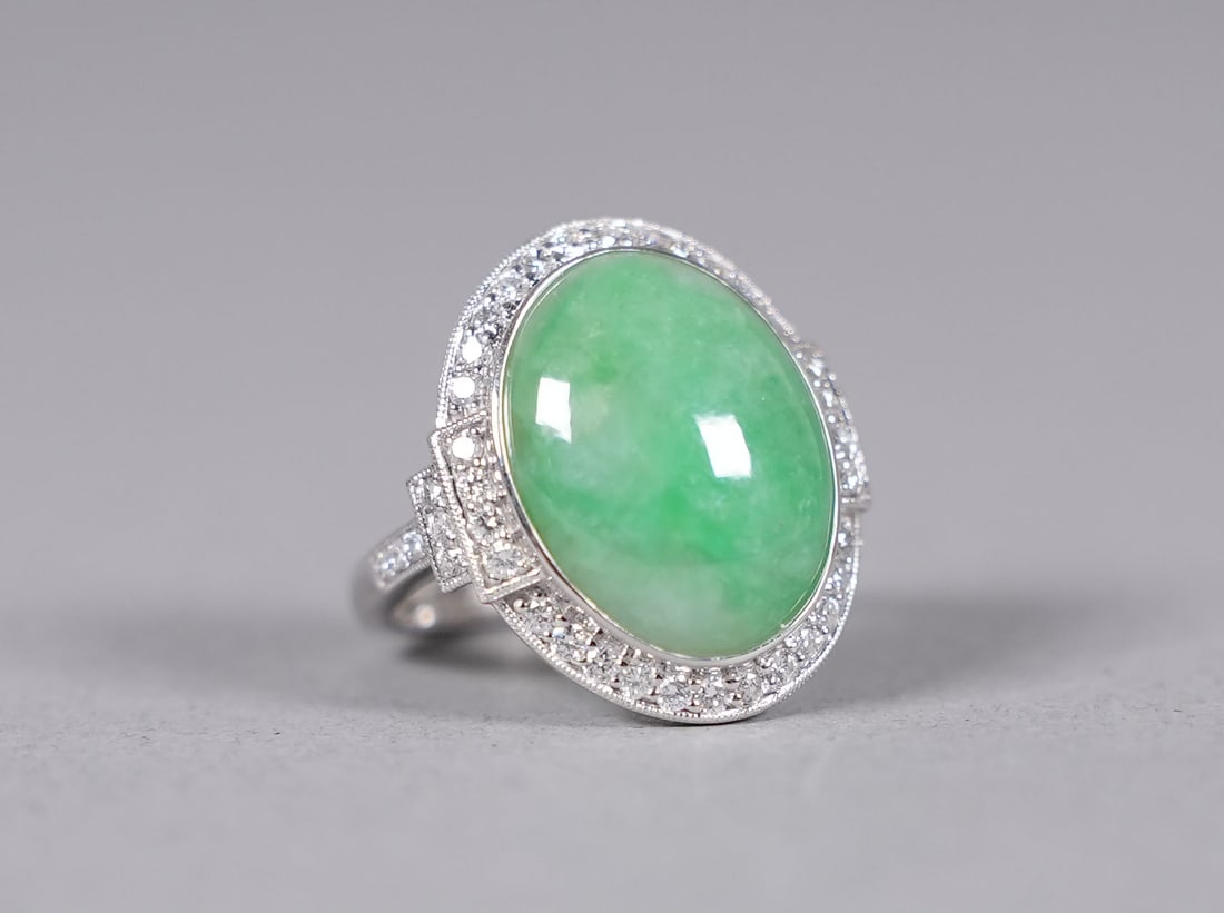 Platinum with natural jadeite diamond ring GIA: Platinum natural jadeite and diamond ring. Comes with GIA certificate. Total 13.93 carats natural jadeite, and total 0.59 carats natural diamonds. US ring size 7.25.