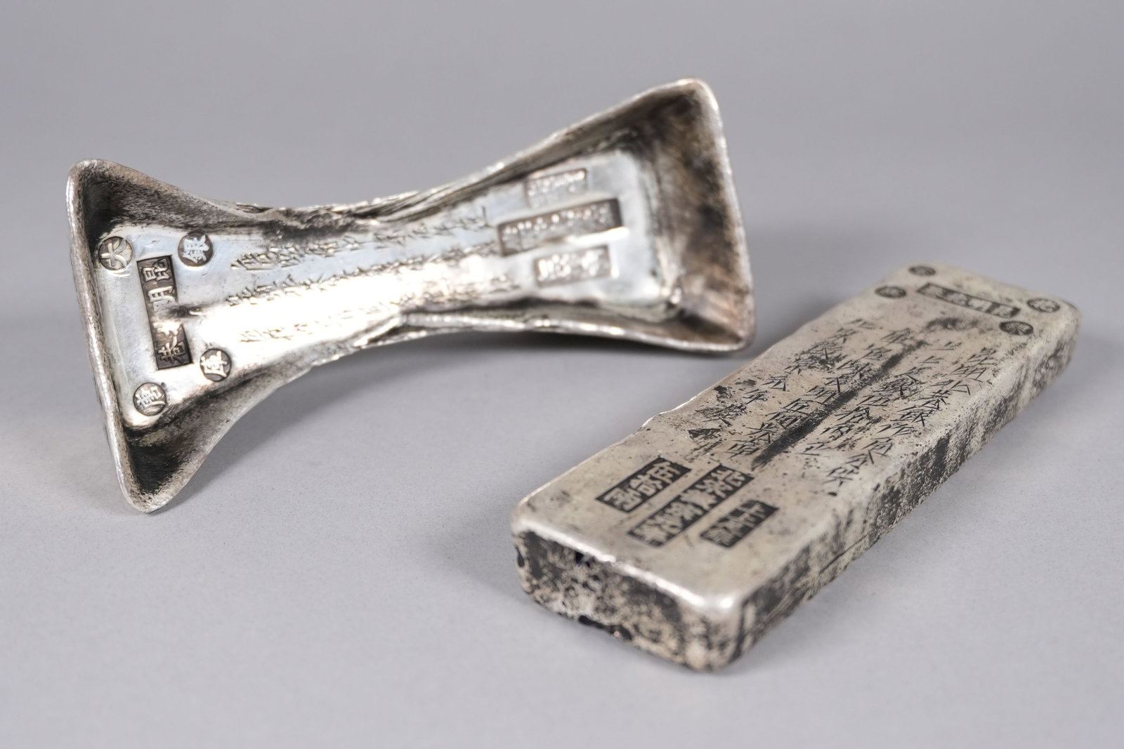 Lots Chinese ingots ungraded: Lots Chinese ingots ungraded. We do not guarantee its age, material, engraving, carvings or any type of grading. All sales are final, condition selling it as is. No return.