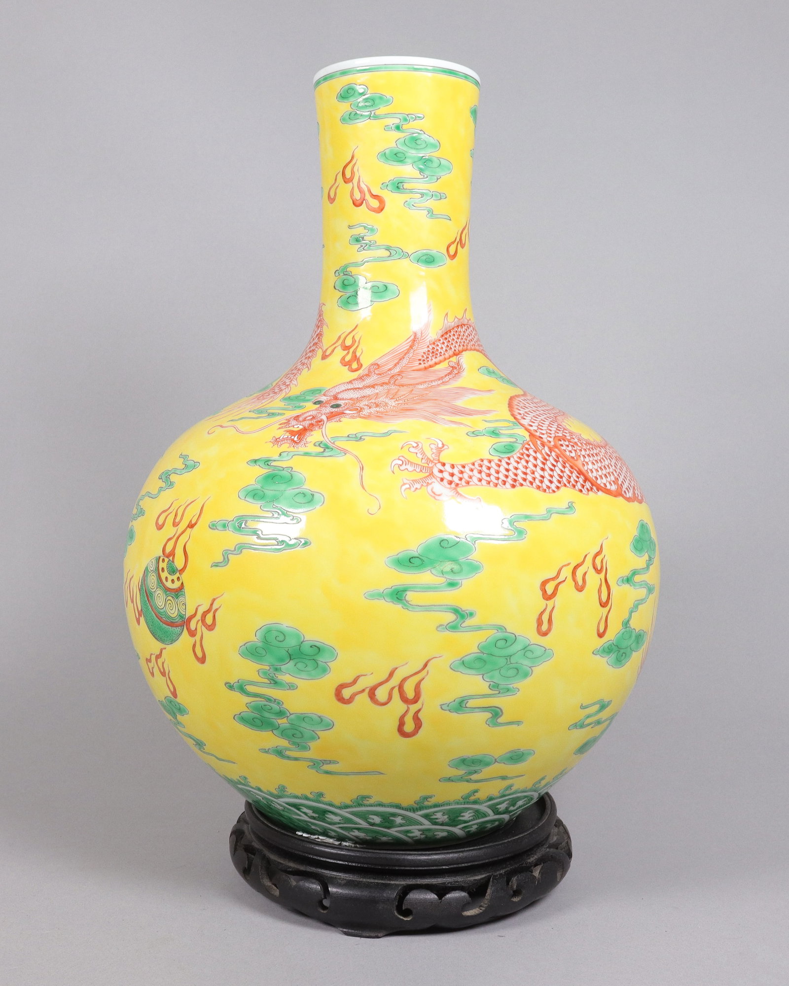 Chinese fine yellow dragon vase: Chinese fine yellow dragon vase. H: 15" x W: 10."