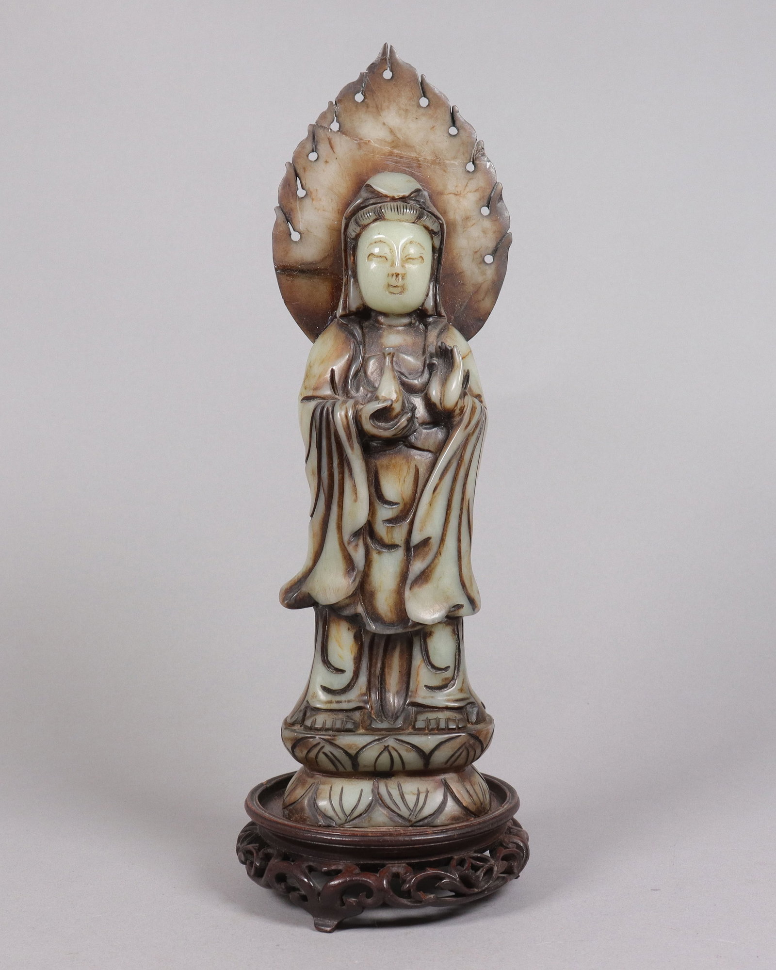 Chinese tall jade carved buddha: Chinese tall fine jade buddha. H: 12" x W: 4."
