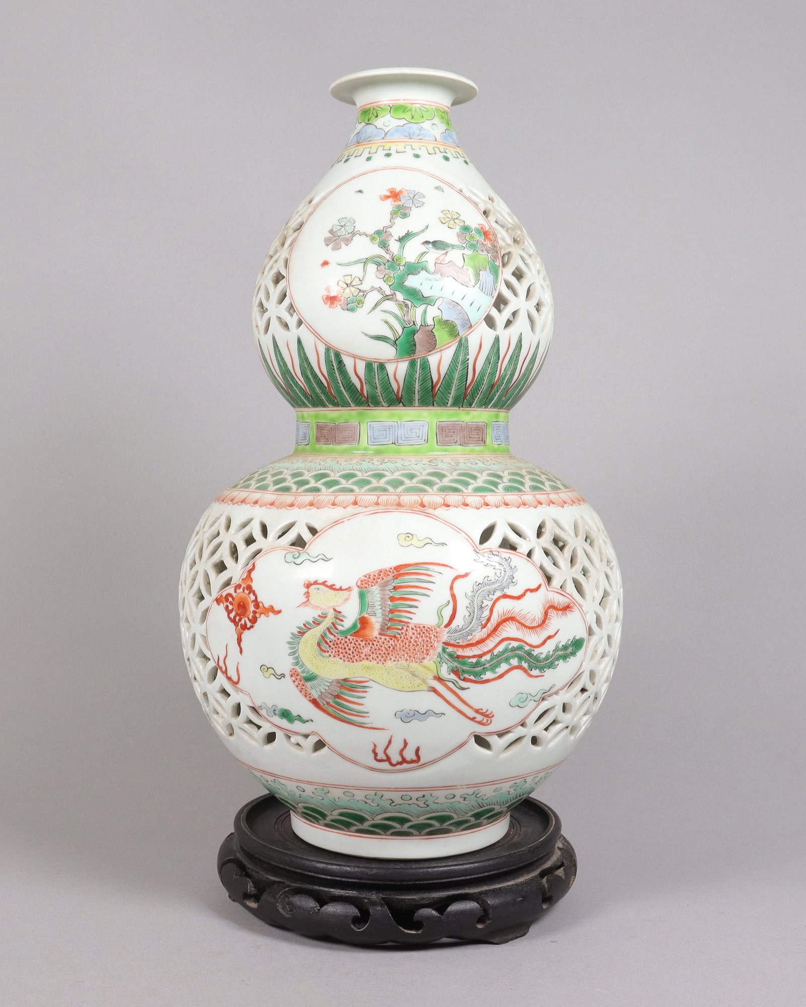 Chinese tall hollow vase: Chinese tall hollow gourd vase. H: 14.5" x W: 9.1."