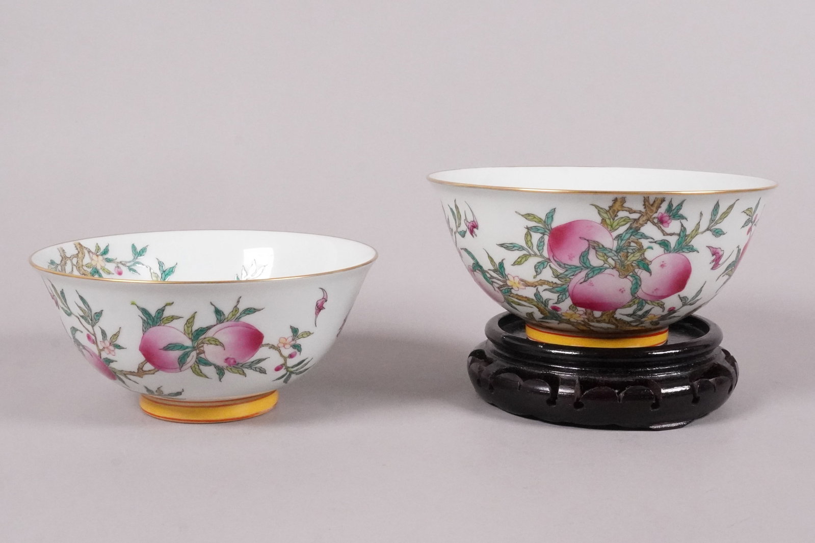 2 Chinese fine peach bowls: 2 Chinese fine peach bowls. H: 2.8" x W: 6.2."