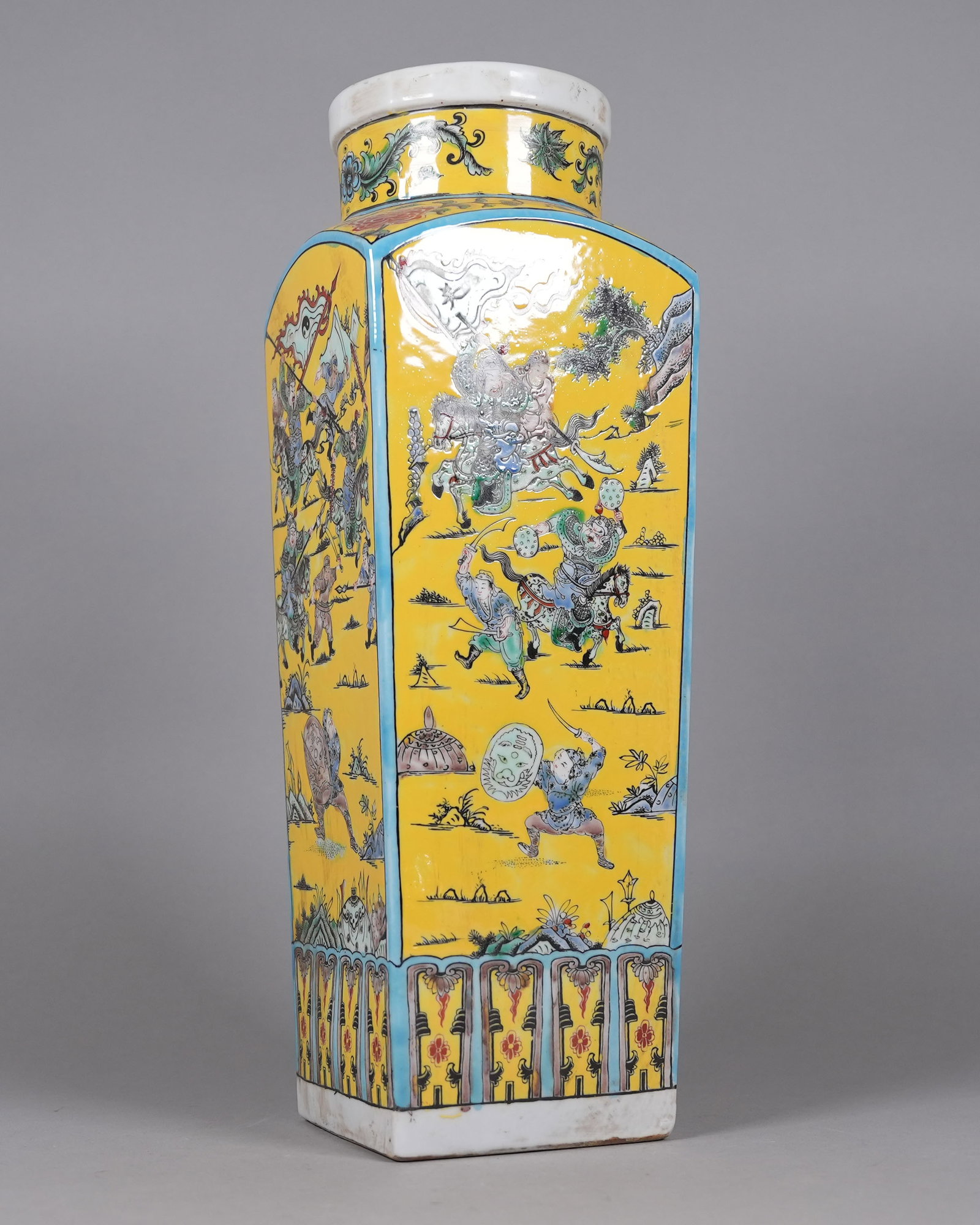 Chinese tall yellow square vase: Chinese tall yellow square vase. H: 18.6" x W: 6.1."