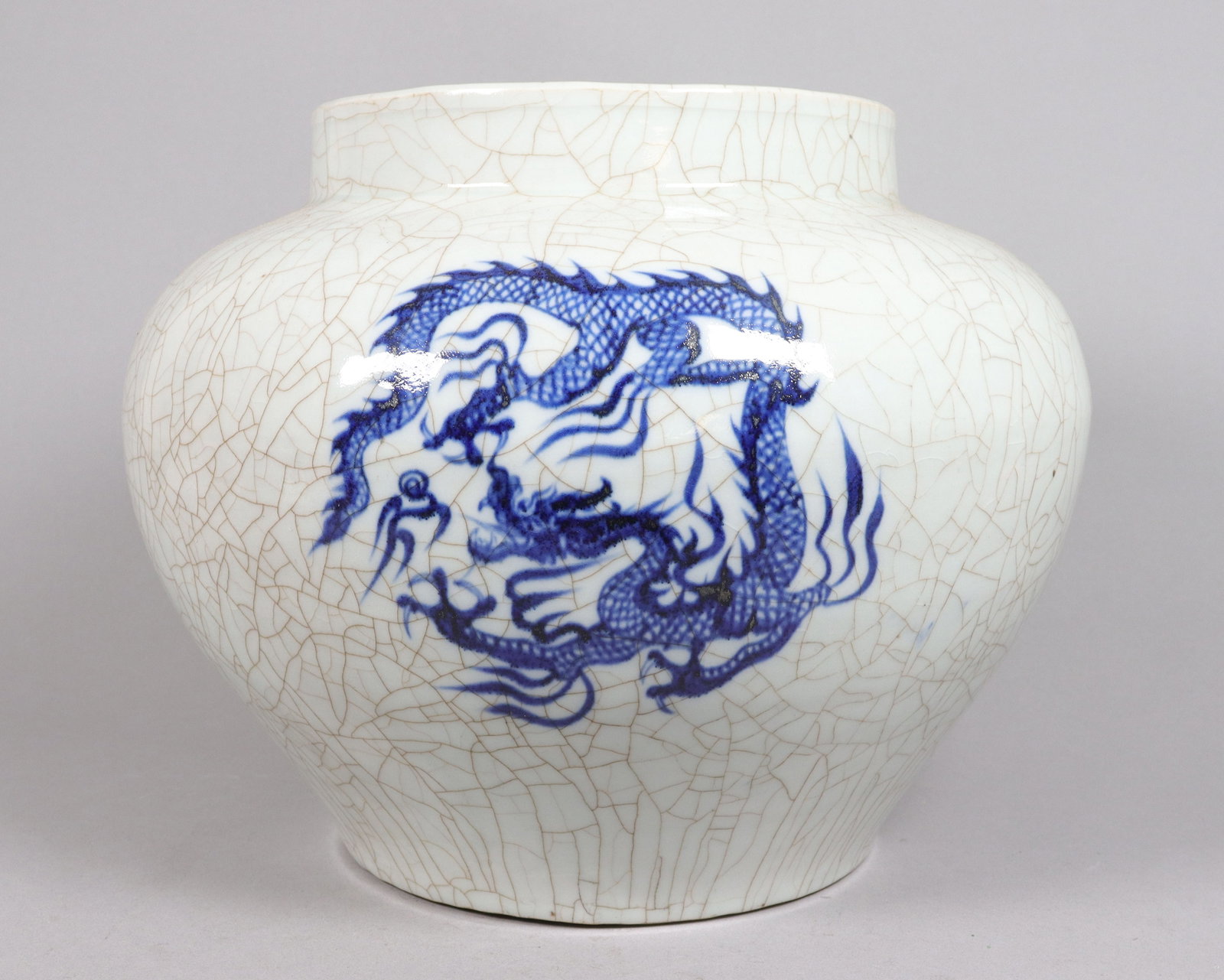 Chinese tall crackled jar: Chiense tall fine crackled jar. H: 11" x W: 14."