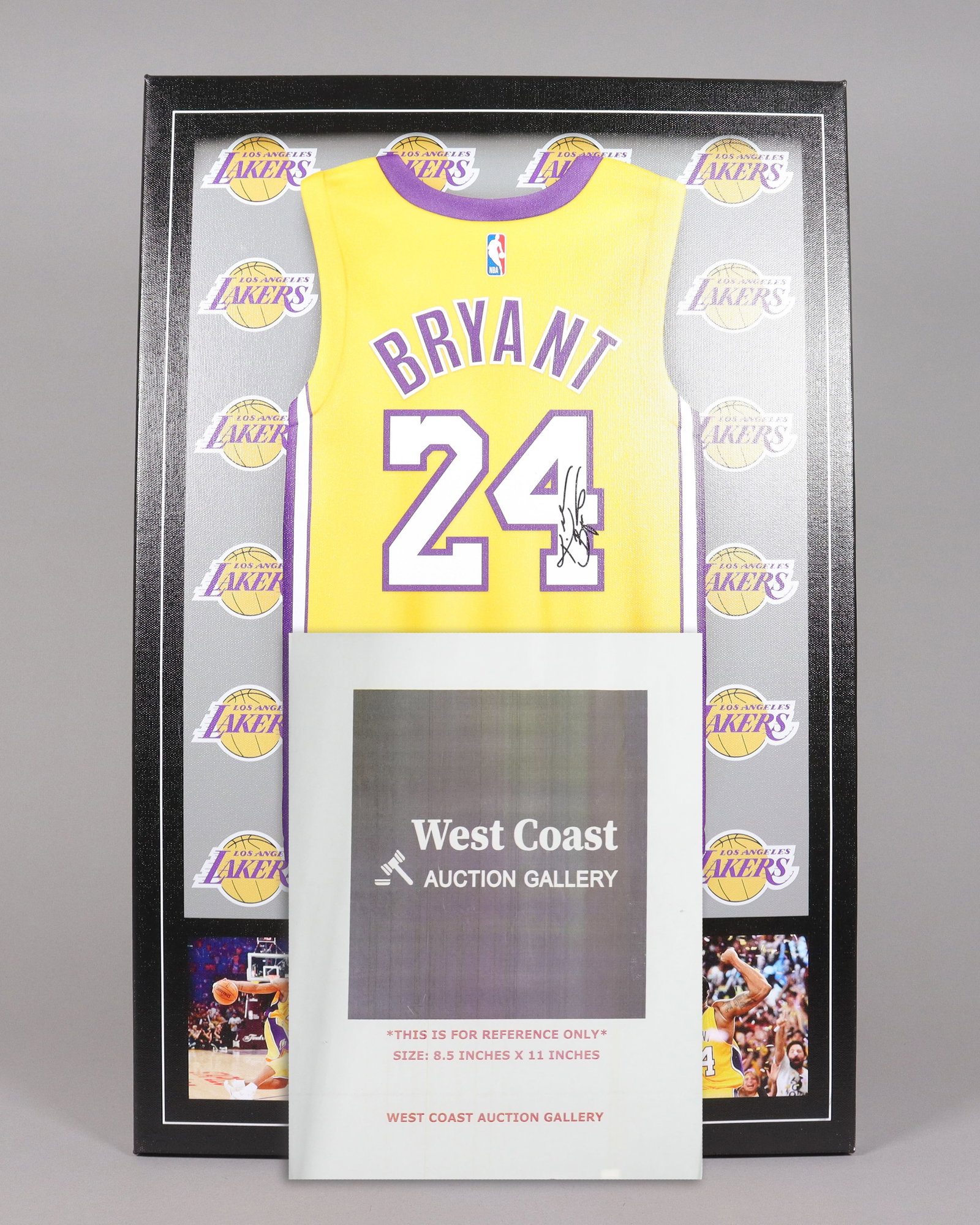 A framed Kobe Bryant signed item - 2