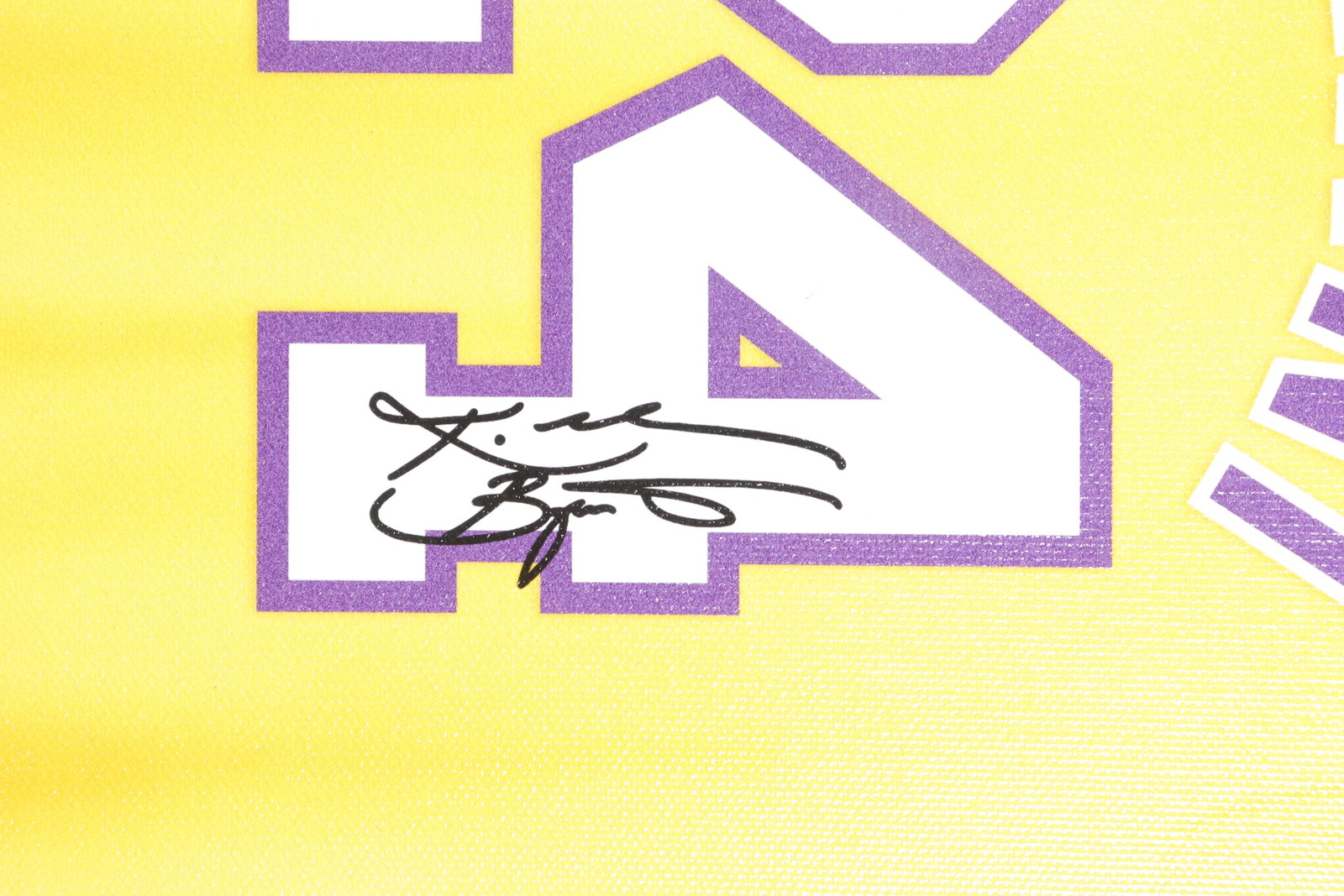 A framed Kobe Bryant signed item - 3