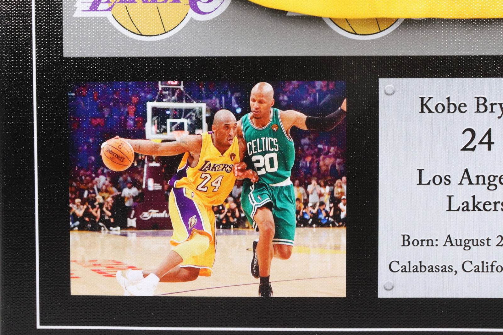 A framed Kobe Bryant signed item - 4
