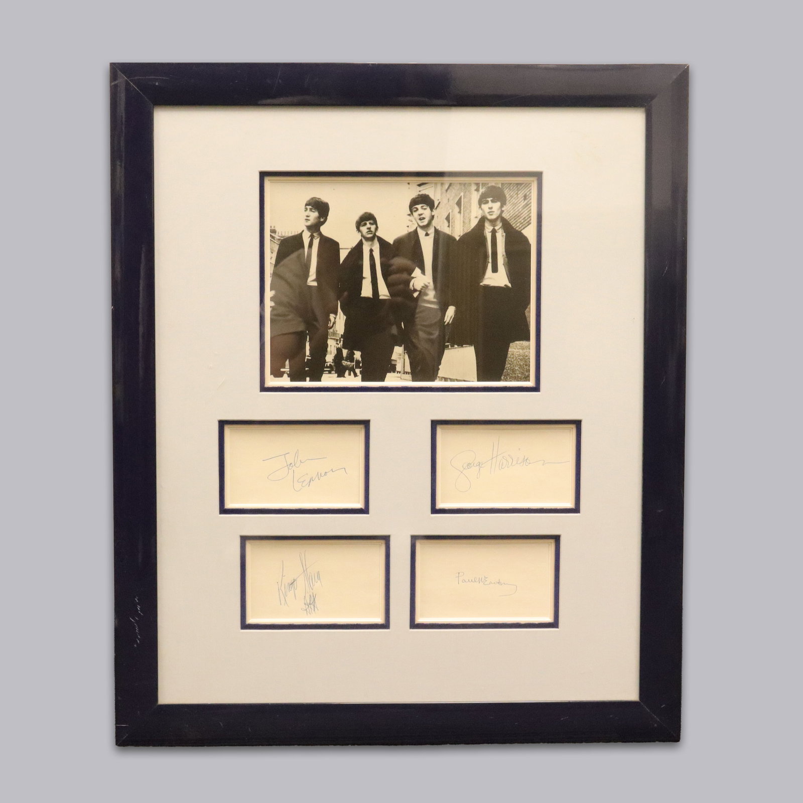 Beetles hand signed paper with photo estate: Beetles hand signed on paper, with photo framed. From a major estate. H: 25" x W: 21."