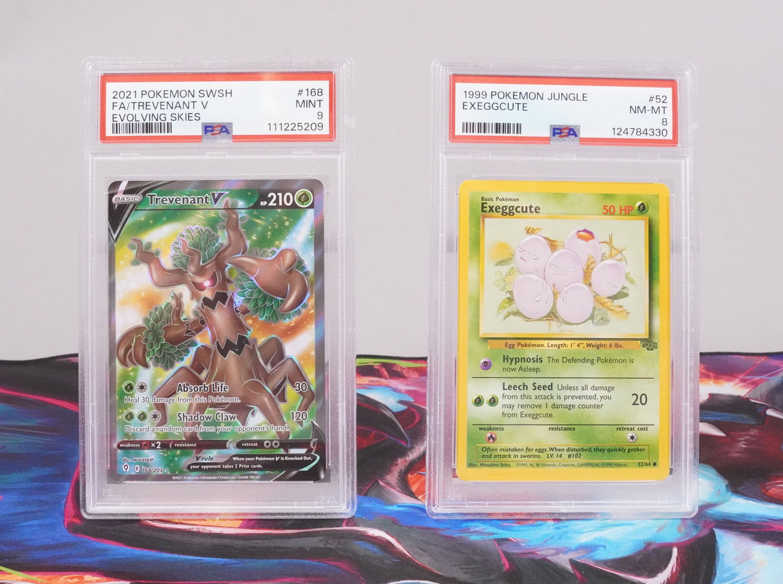 2 Pokemon cards graded PSA: 2 Pokemon cards, PSA graded.