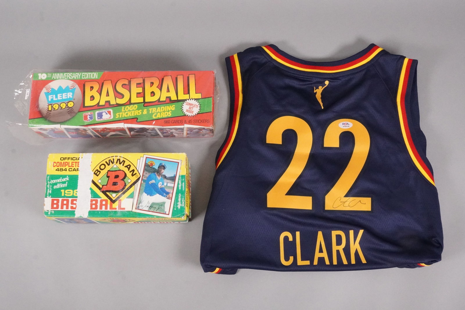 Caitlin Clark signed jersey PSA and cards: Caitlin Clark signed jersey PSA graded, and other sports card sealed.