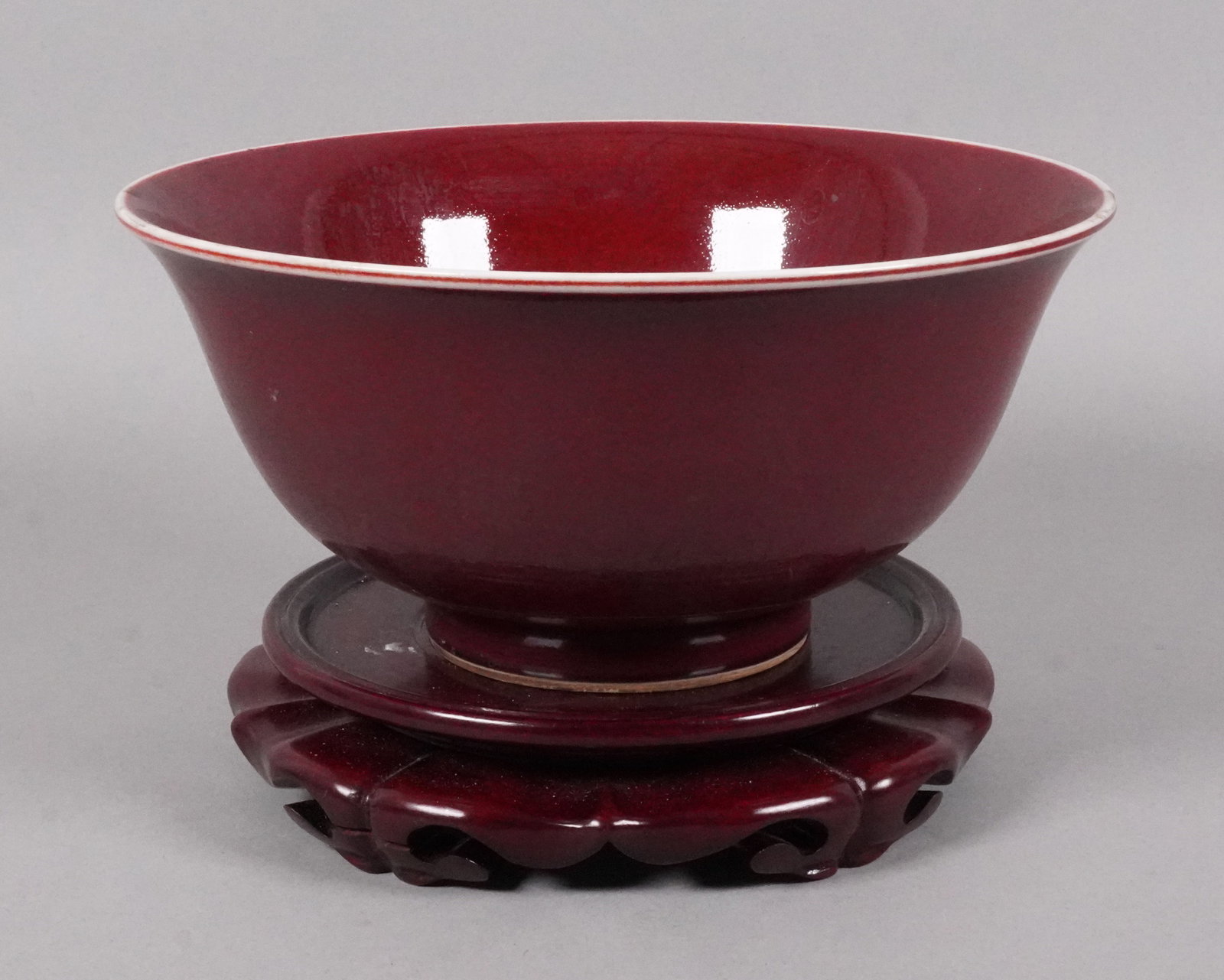 Chinese large red glaze bowl: Chinese large red glaze bowl. H: 4" x W: 8.6."