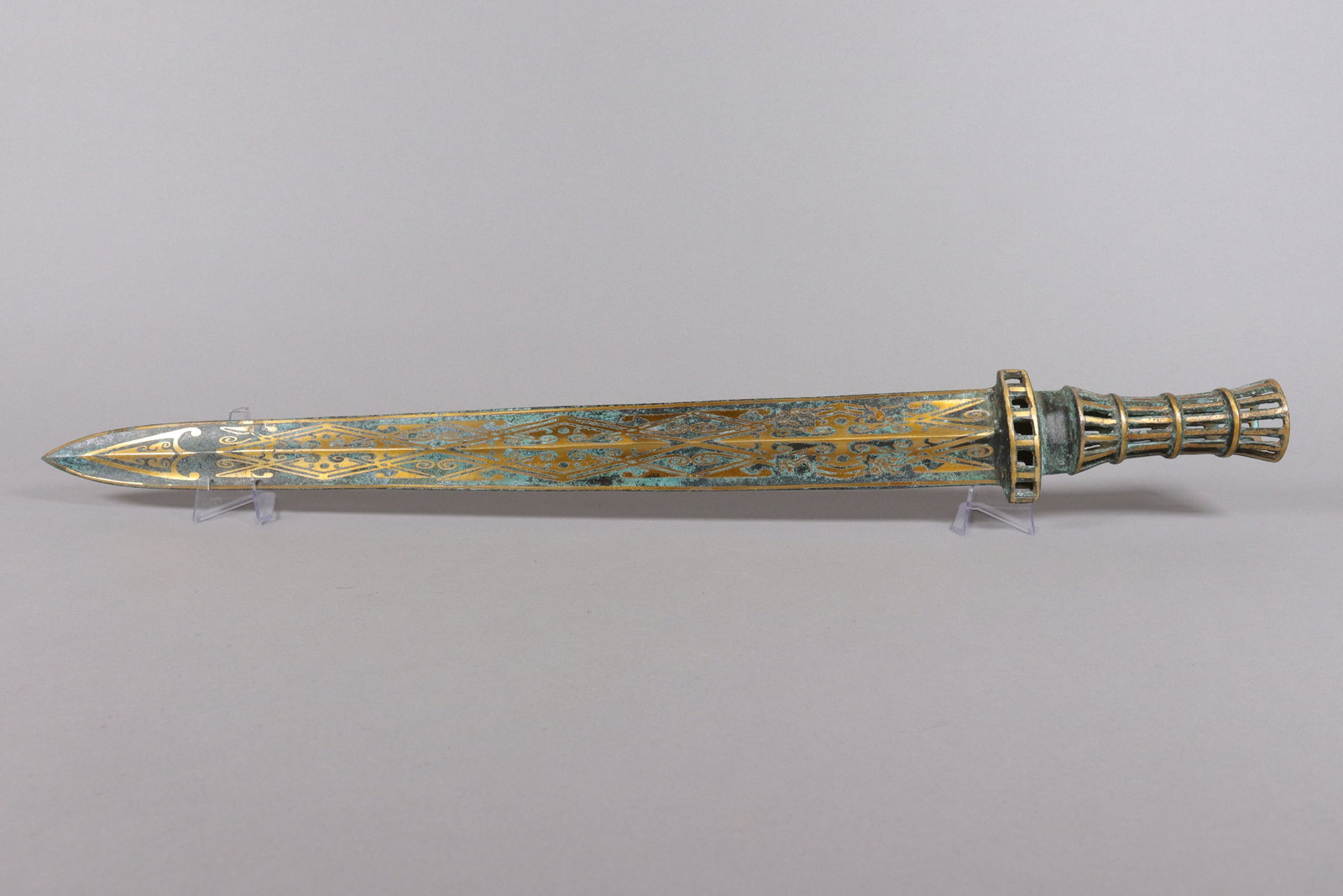 Chiese long gilted bronze sword: Chinese long gilted bronze sword. L: 25.5" x W: 3."