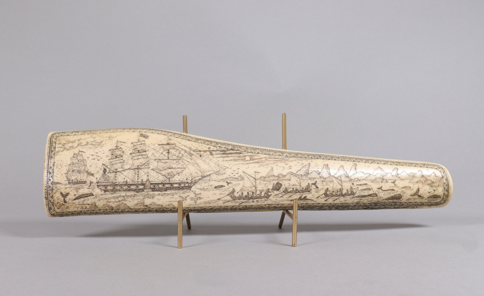 A large estate carved item: A large estate carved item, ungraded. We do not guarantee its material, age, carvings, or engravings. All sales are final, no return. H: 4" x W: 17."
