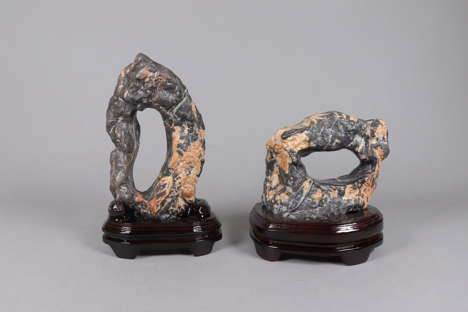 2 Chinese scholar stone with stand: 2 Chinese fine heavy scholar stones with wooden stand.