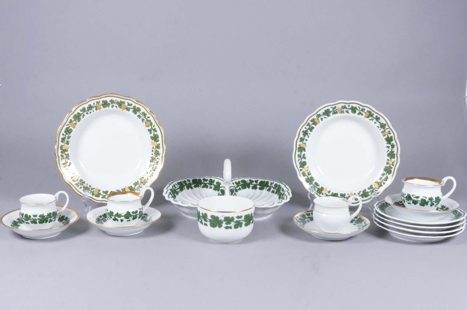 Lots antique green floral Meissen porcelains: Lots antique green floral Meissen porcelain tea items. Largest H: 4.3" x W: 11."
