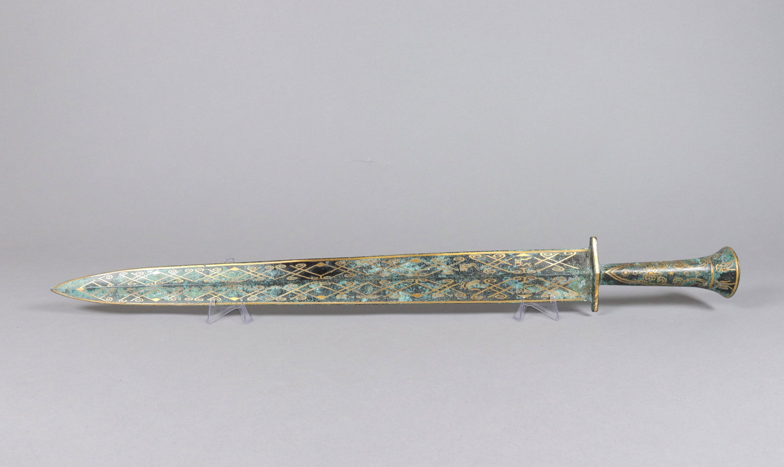 Chinese long bronze sword: Chinese long bronze sword. L: 25.5" x W: 2.5."
