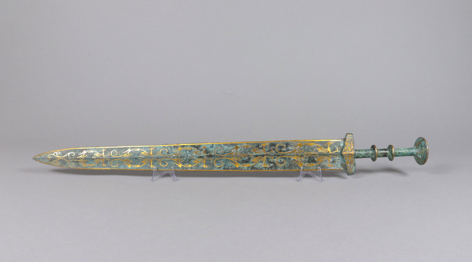 Chinese long gilted bronze sword: Chinese long gilted bronze sword. L: 24.85" x H: 3.1."