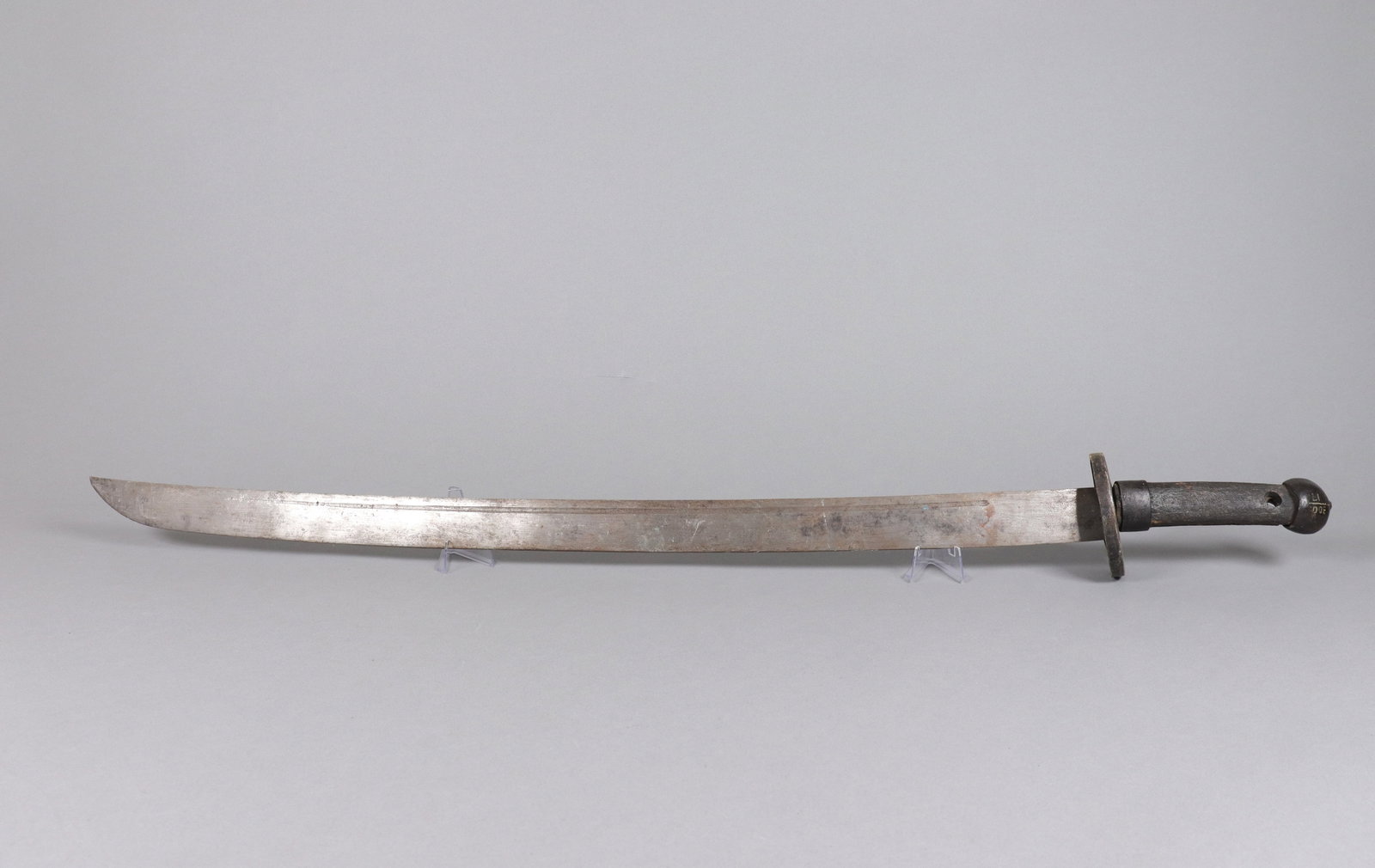 An antique Chinese sword: An antique Chinese sword. L: 35" x H: 3.5."