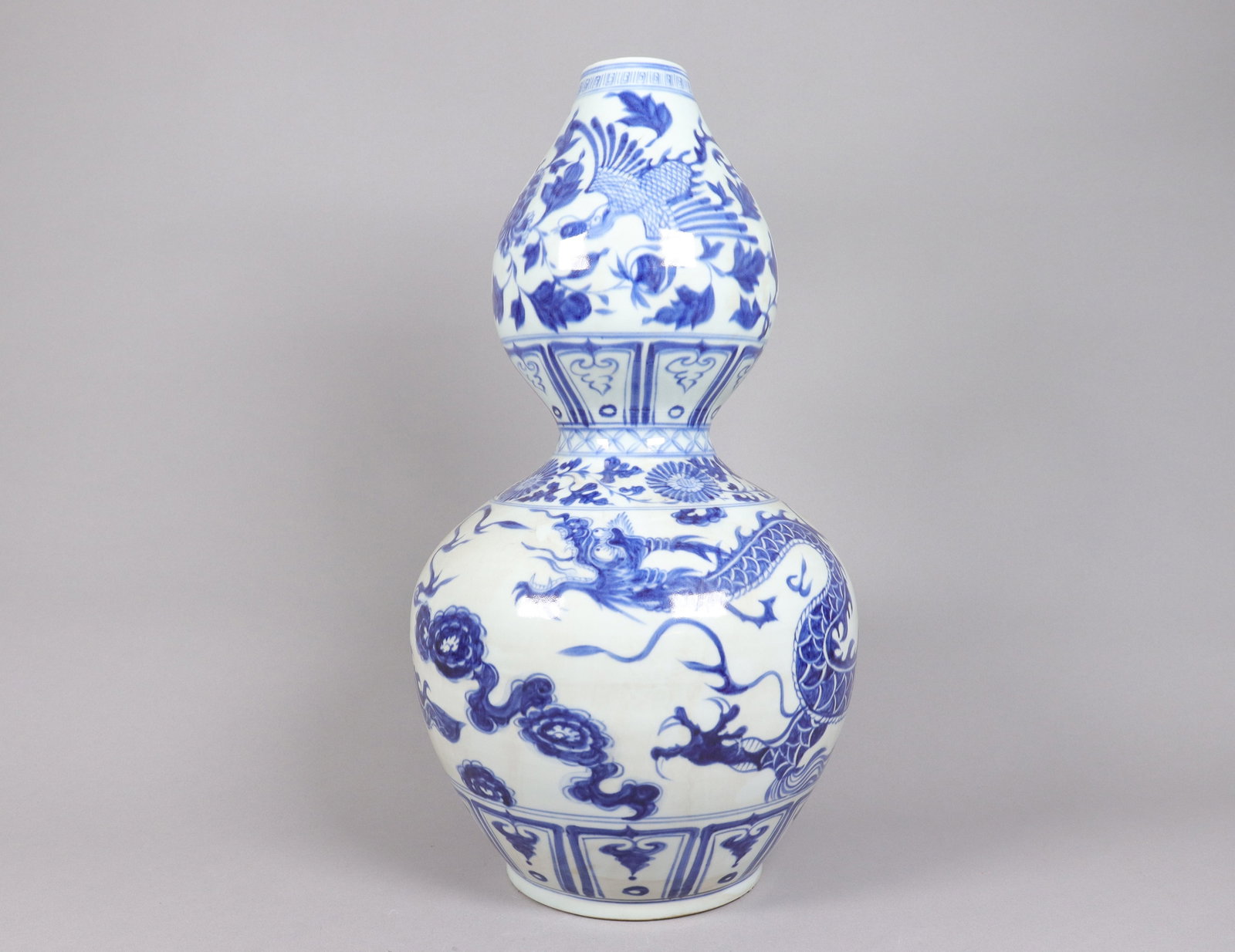 Chinese large fine dragon gourd vase: Chinese large fine dragon gourd vase. H: 19" x W: 10."