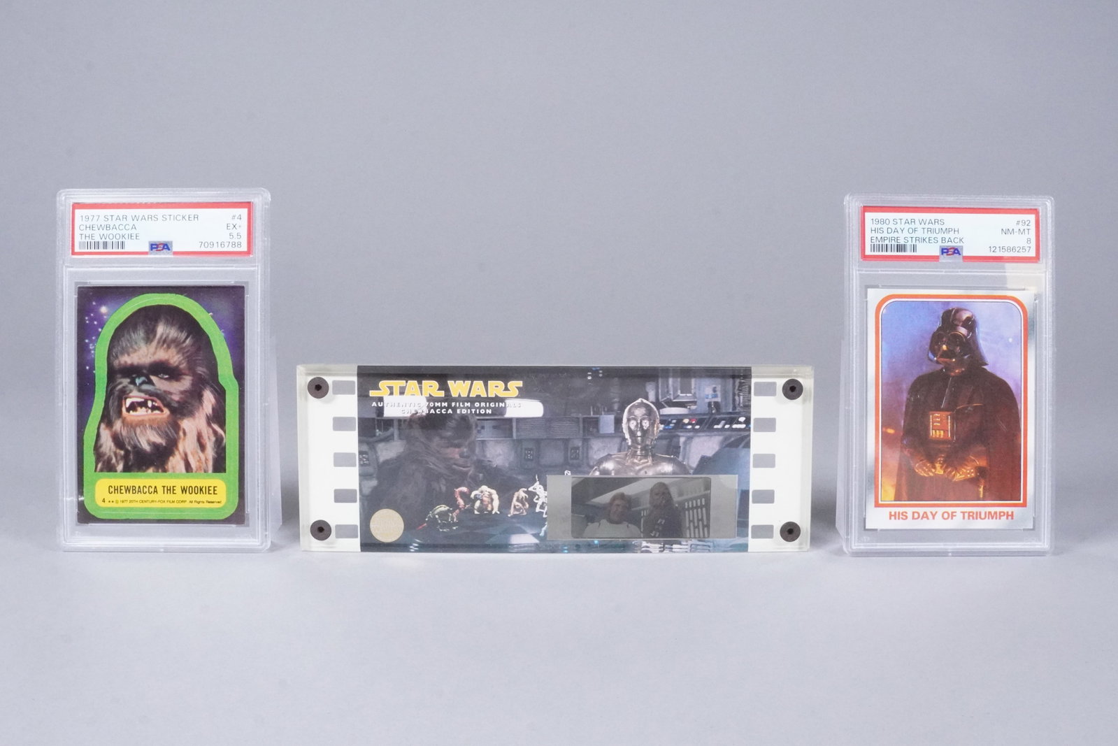 2 Star Wars card with original movie cell: 2 Star Wars card, PSA graded and original movie cell.