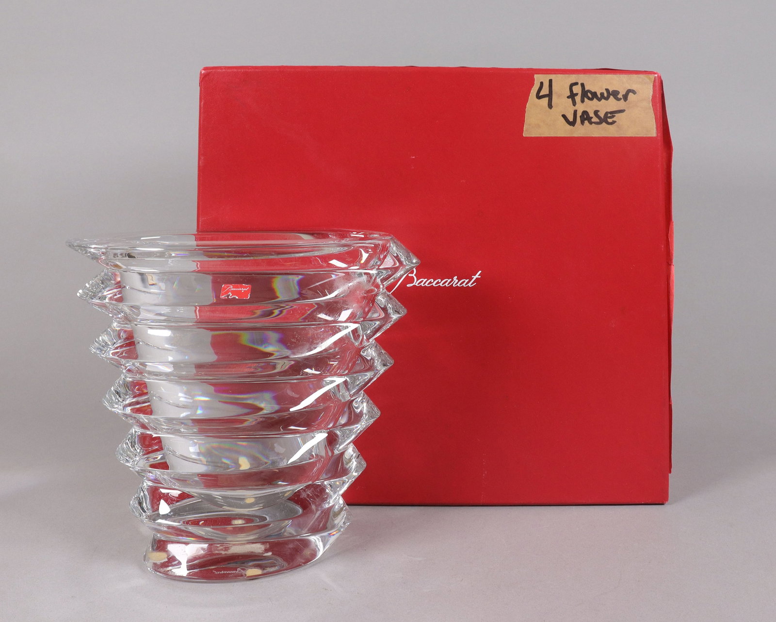Baccarat fine heavy crystal vase: Baccarat fine heavy crystal vase, comes with original box. H: 9" x W: 8."