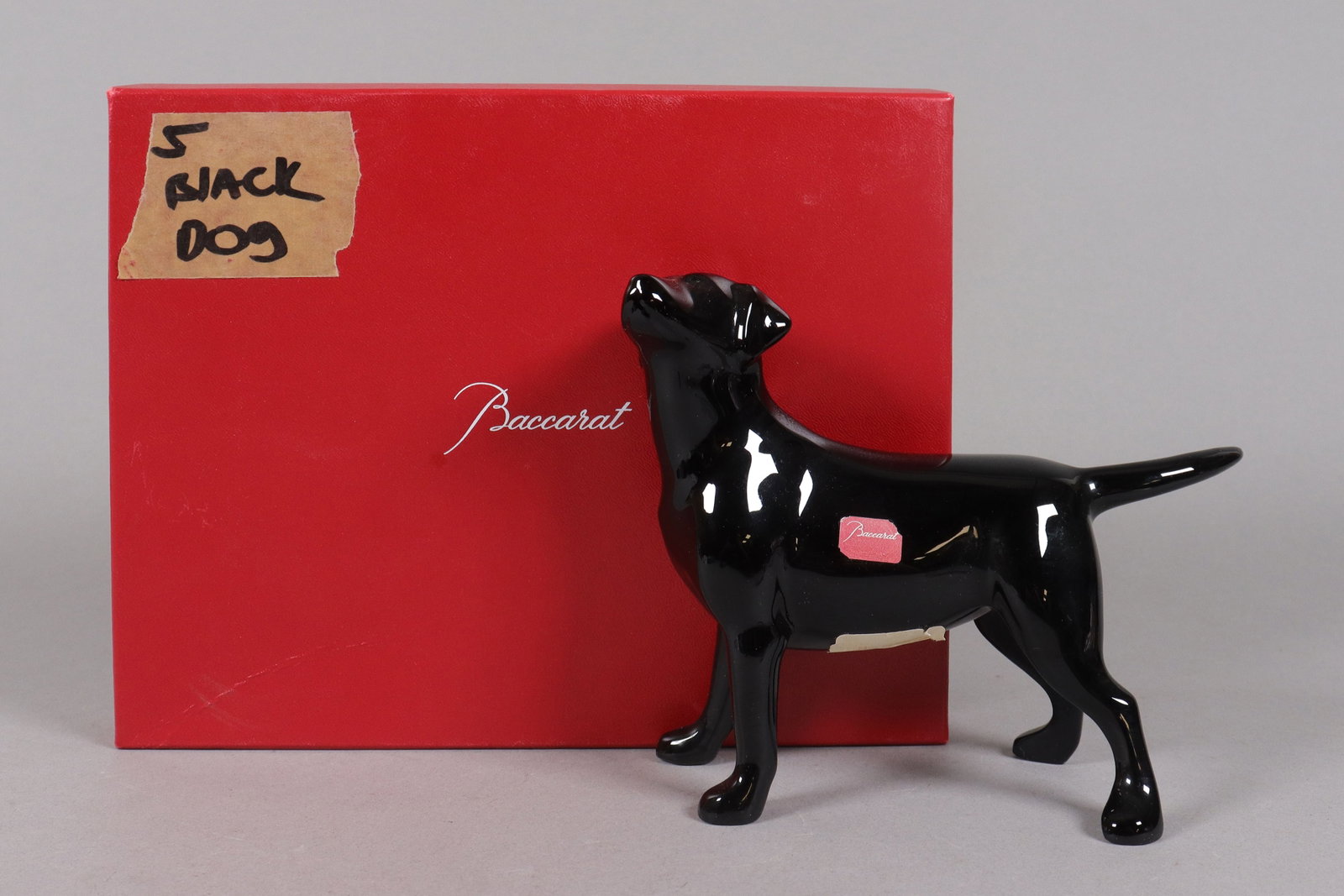 Baccarat limited crystal dog figure with box: Baccarat limited crystal dog with original box. H: 5.55" x W: 6.75."