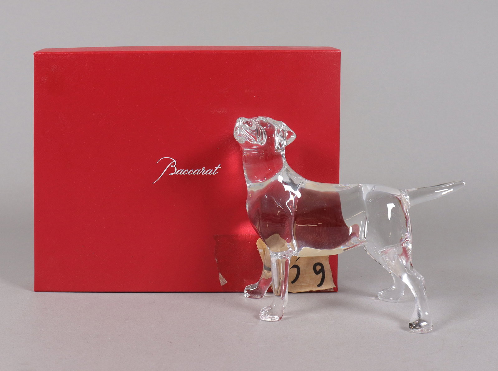 Baccarat dog crystal figure with box: Baccarat dog crystal figure with original box. H: 5.5" x W: 6.75."