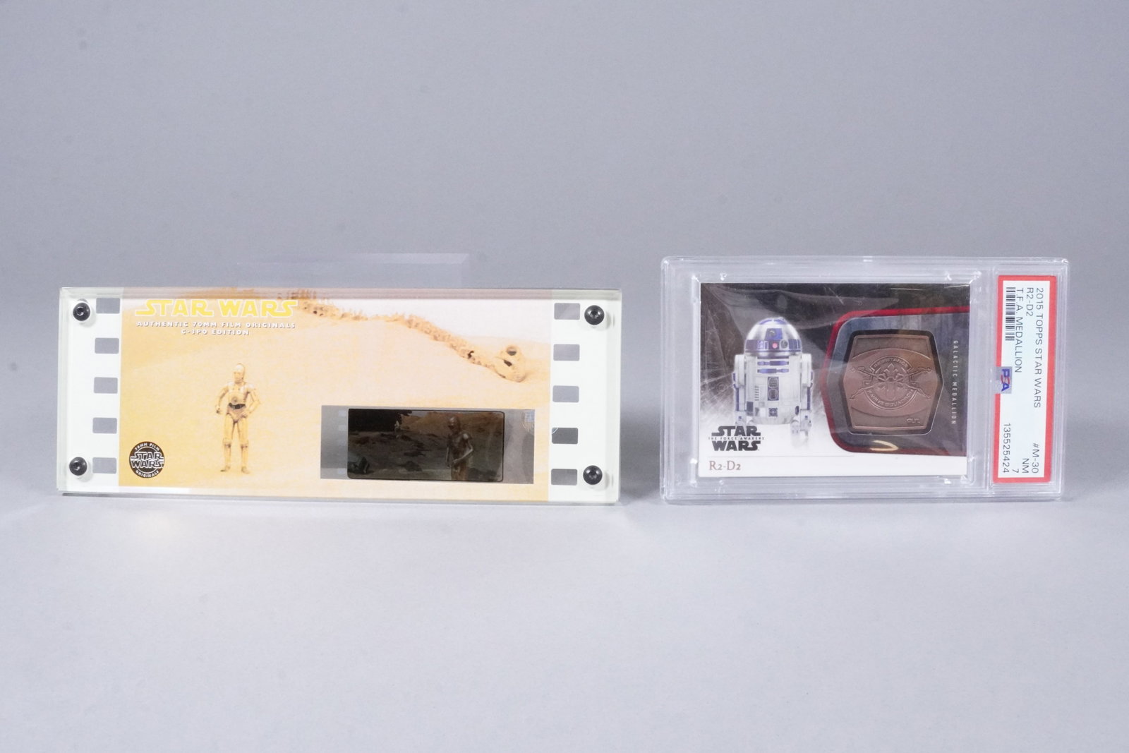 Star Wars movie cell and Star Wars medallion card: Star Wars movie cell, and Star Wars rare medallion card, PSA graded.