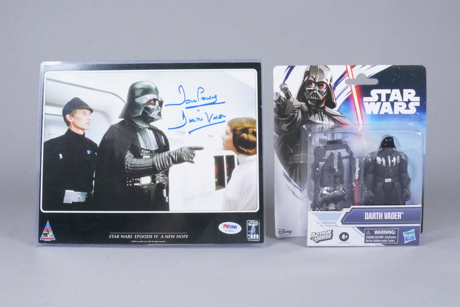 Darth Vader signed photo and action figure: Darth Vader signed photo, PSA graded, and a Darth Vader action figure in original box.