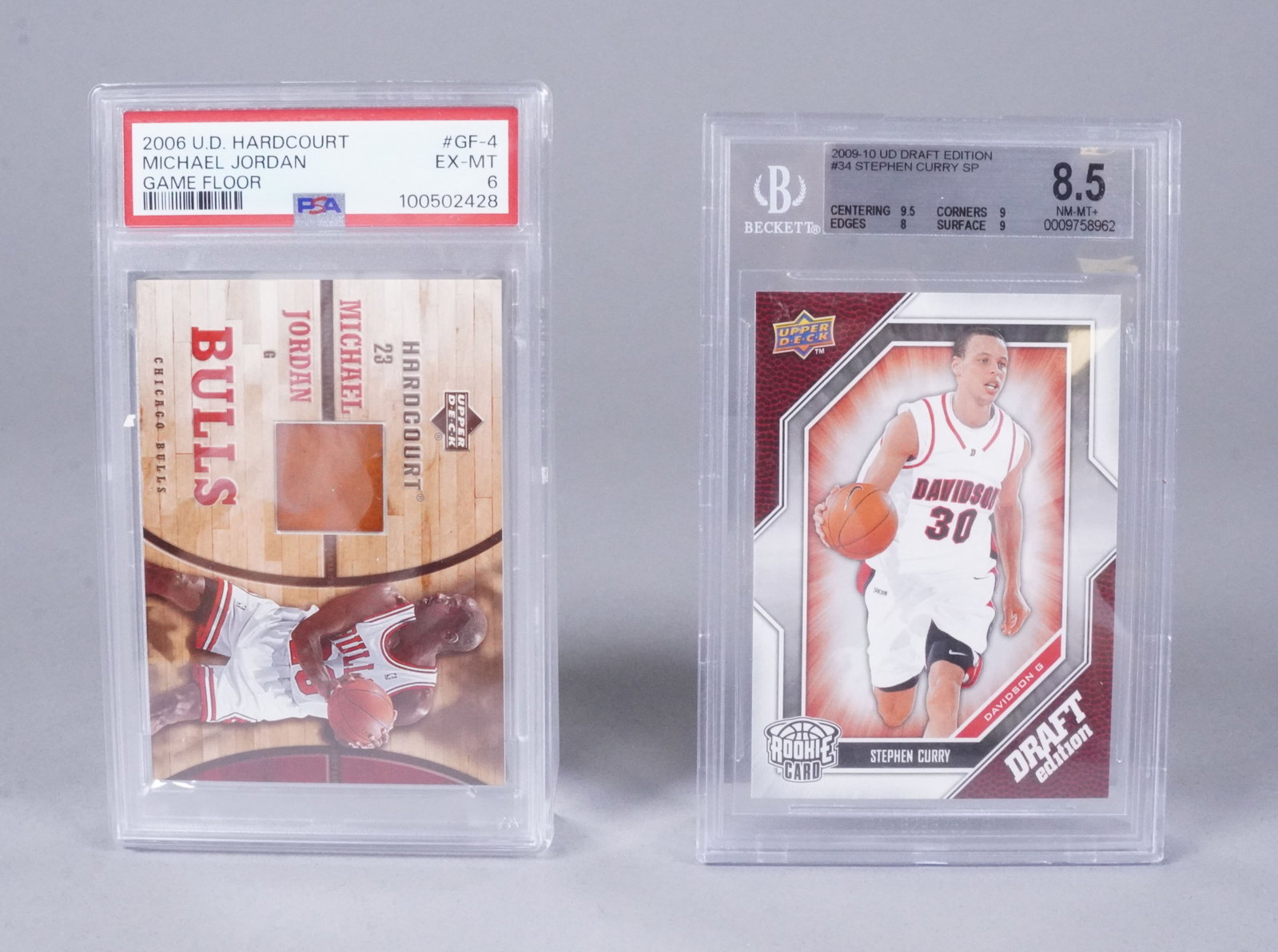 2 graded basketball cards Jordan Curry: 2 graded basketball cards, Michael Jordan rare relic card, PSA. Steph Curry rare rookie card, Beckett graded.