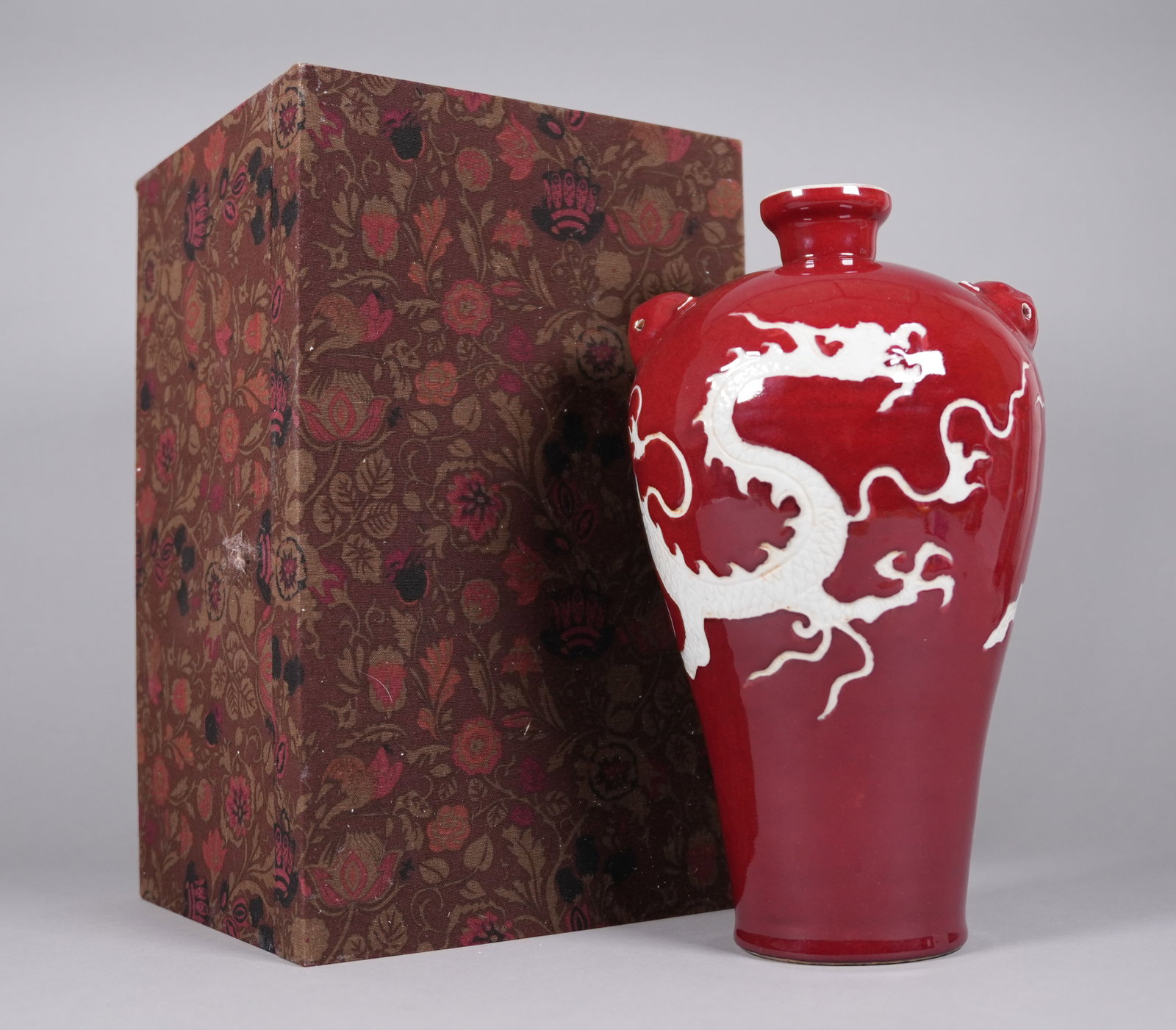 Chinese large fine red vase with heavy silk box: Chinese large red vase with heavy silk box. H: 13.8" x W: 7.5."