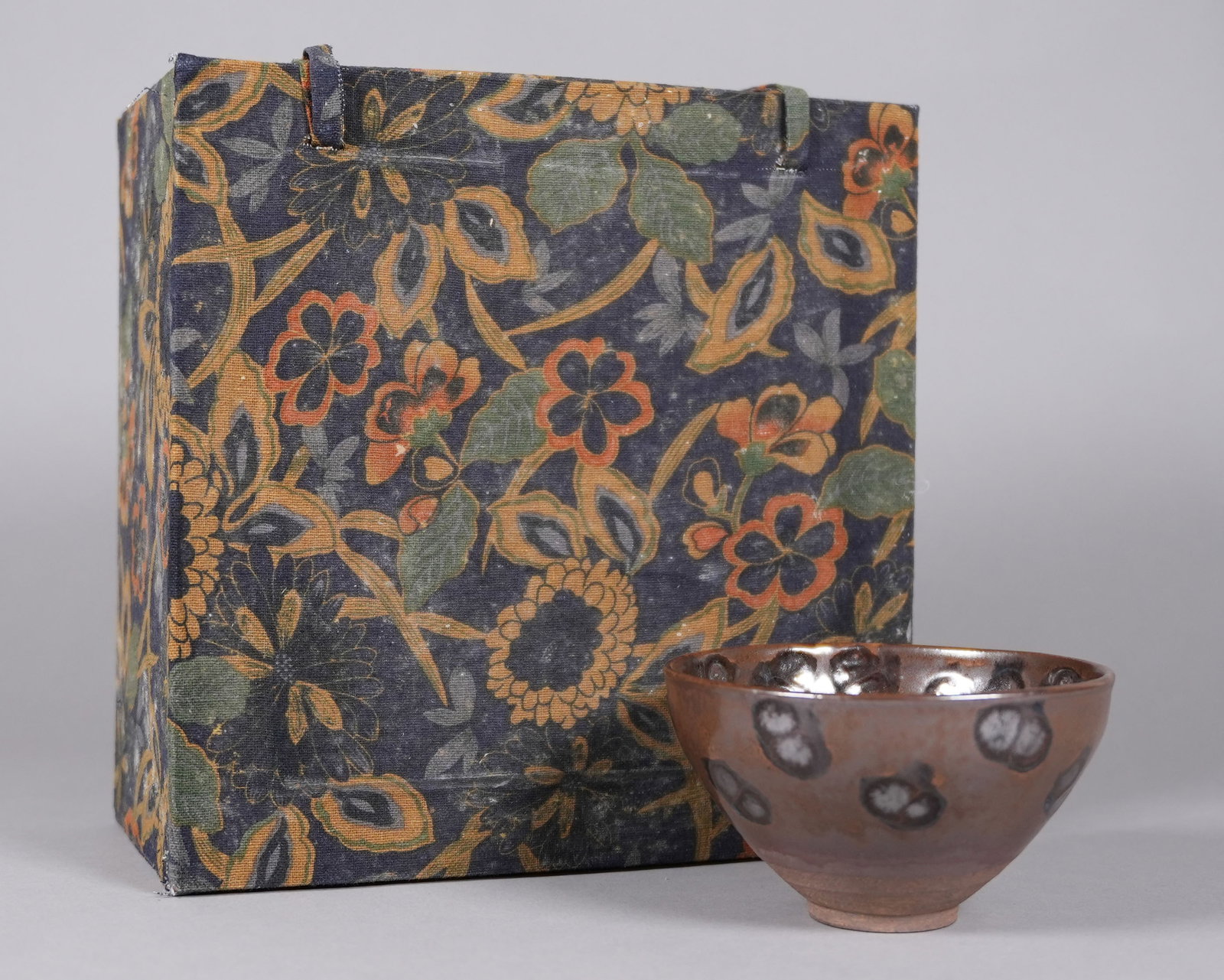 Chinese fine tea bowl with heavy silk box: Chinese fine tea bowl with heavy silk box. H: 2.9" x W: 5.1."