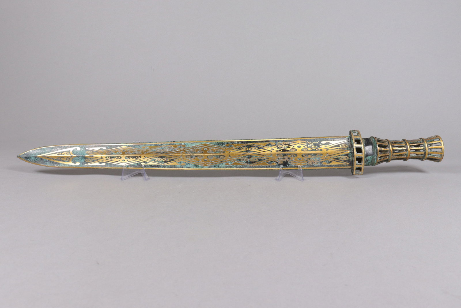 Chinese fine gilted bronze sword: Chinese fine gilted bronze sword. L: 25.75" x W: 3."