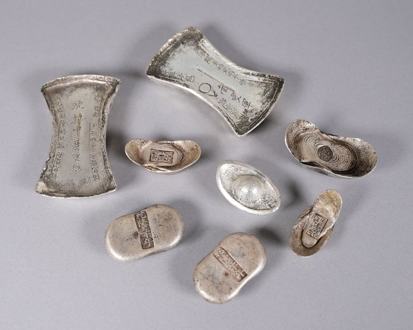 Lots Chinese ingots ungraded: Lots Chinese ingots ungraded, we do not guarantee its grading, age, material, engraving and carvings. Condition selling it as is. All sales are final, no return.