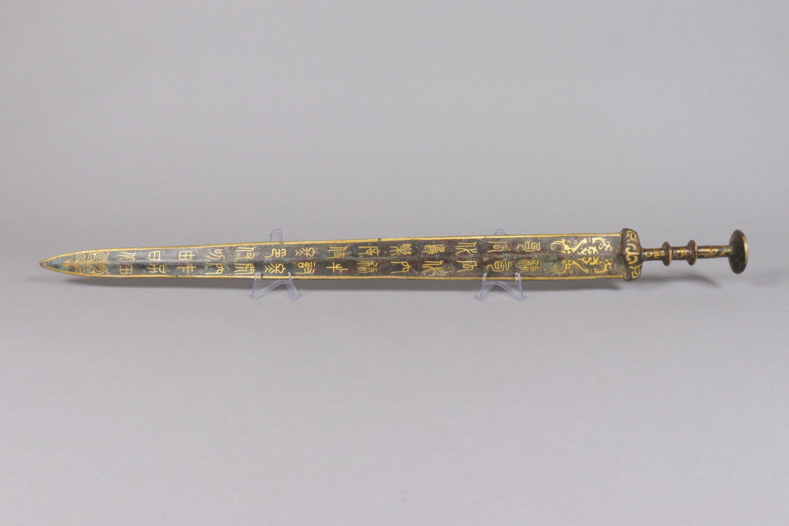 Chinese fine gilted bronze sword: Chinese fine gilted bronze sword. L: 24.5" x W: 2."