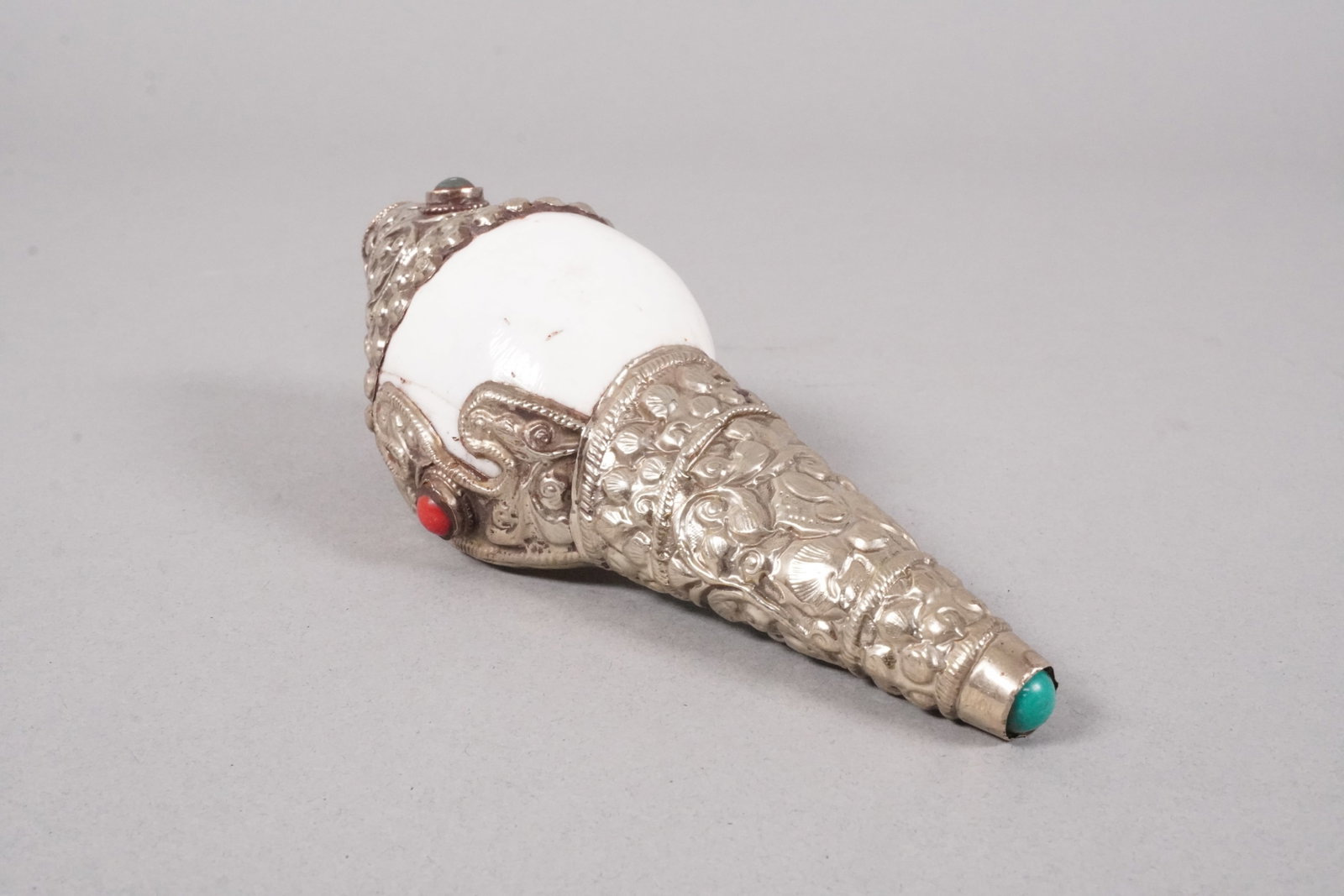 Tibetan fine praying shell: Tibetan fine praying shell. H: 5.8" x W: 2.2."