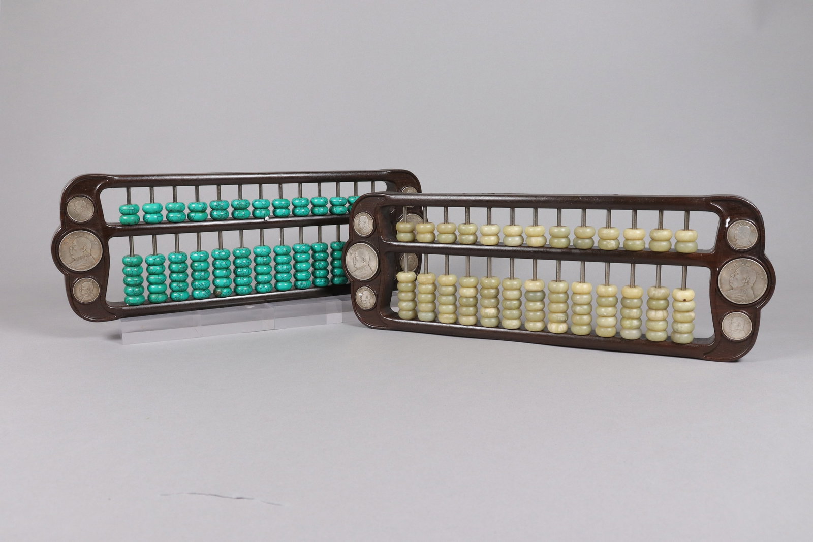 2 Chinese abacus: 2 Chinese abacus, with jade. H: 5.5" x W: 15.75."