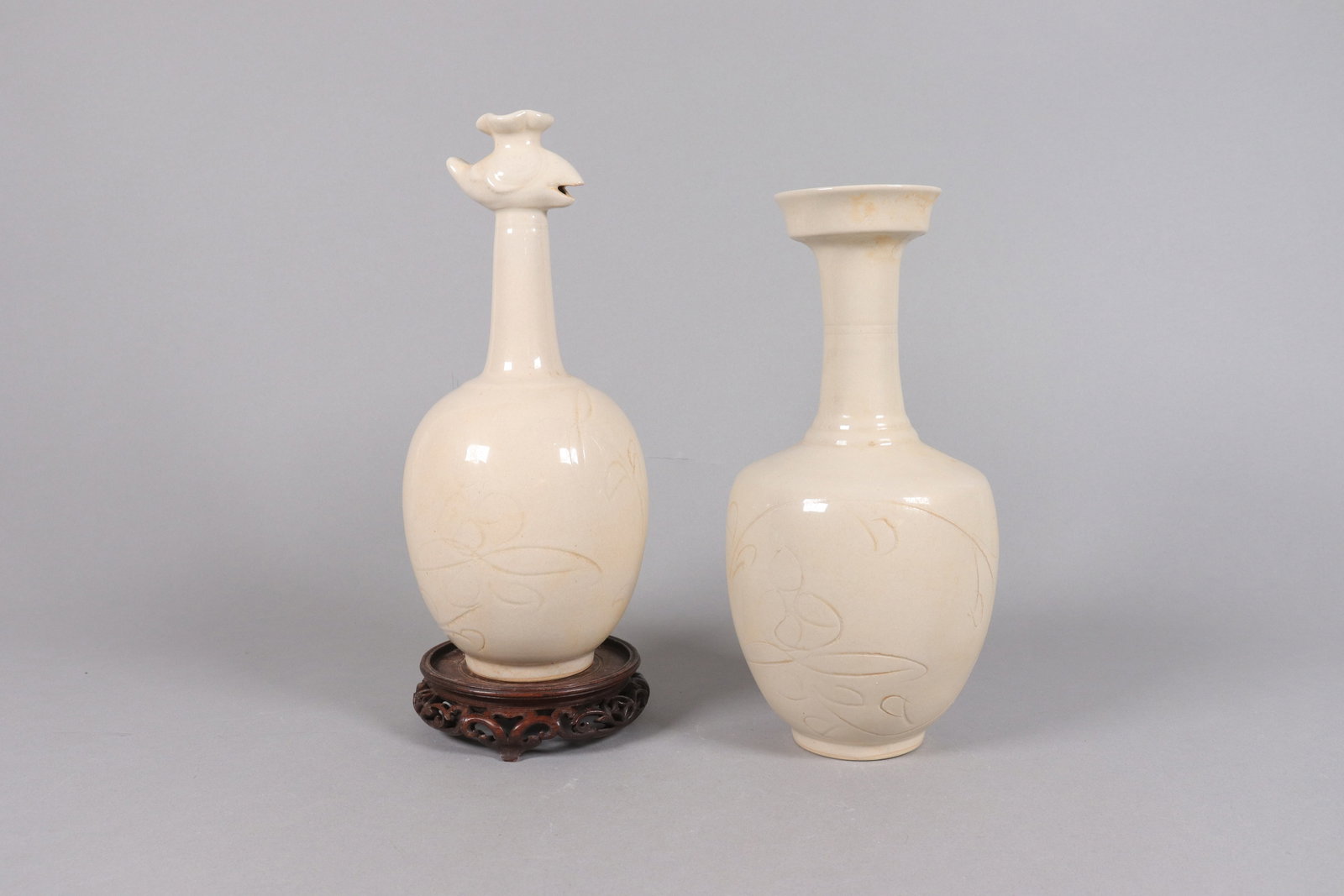 2 Chinese white glaze vase: 2 Chinese white glaze vase. Largest H: 10.75" x W: 5."