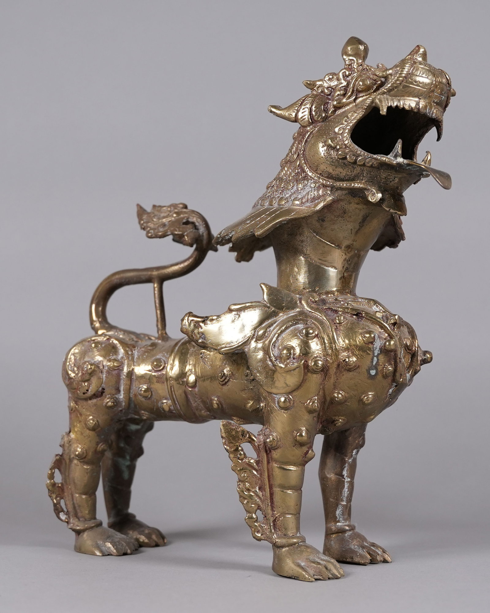 Asian style carved lion: Asian style carved lion, from an estate. H: 13.1" x W: 10."