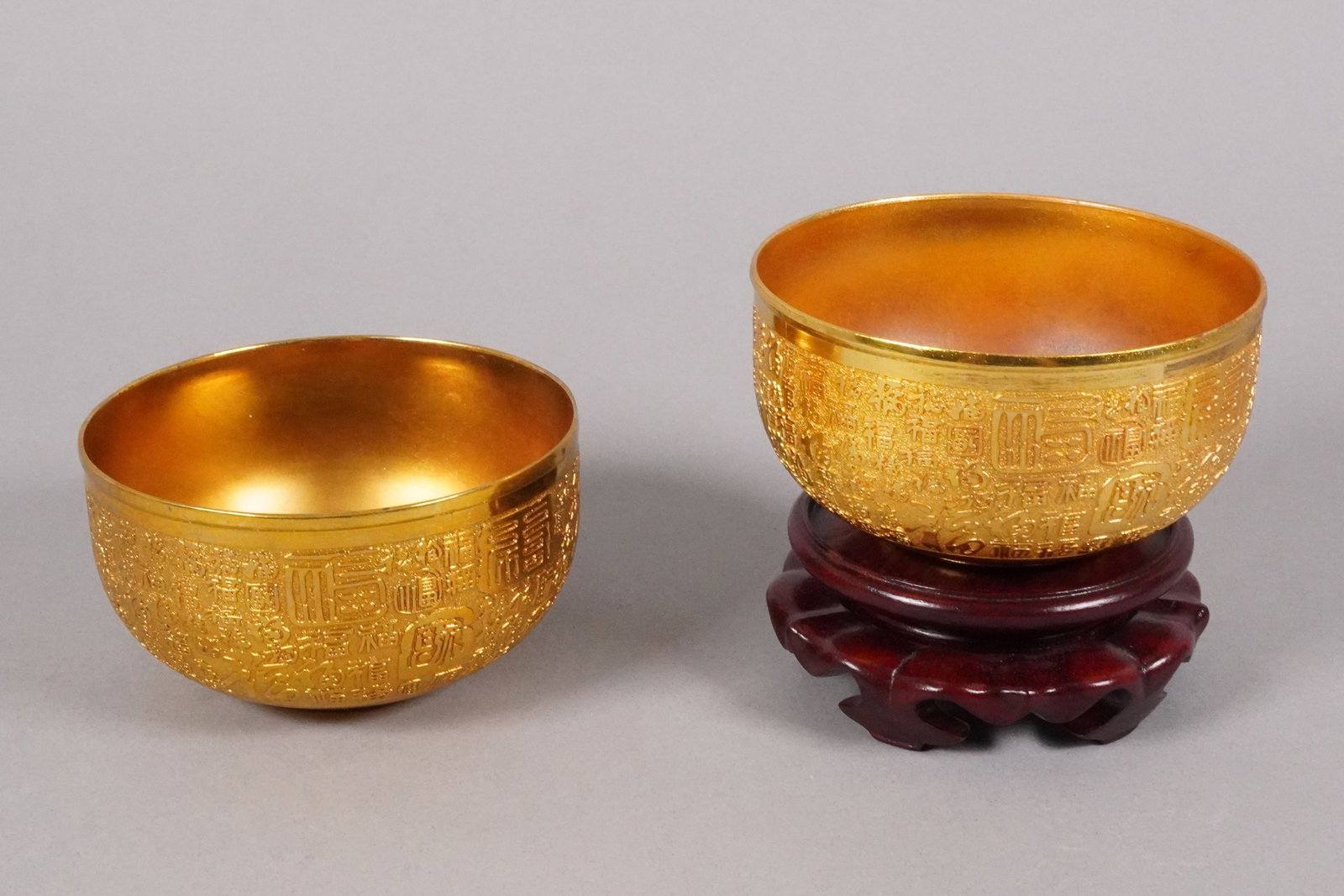 2 Chinese fine carved cups: 2 Chinese fine carved cups. H: 2.4" x W: 4.3."