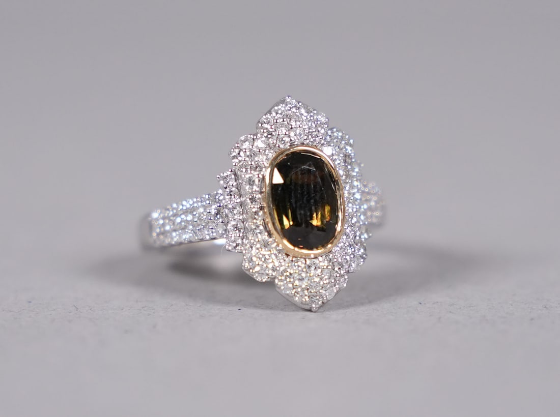 Platinum 18 kt y/g alexandrite chrysoberyl and diamond ring GIA: Platinum and 18 kt yellow gold alexandrite chrysoberyl diamond ring. Comes with GIA certificate. US ring size 6.8. Total 1.46 carats natural alexandrite chrysoberyl and total 0.72 carats diamond.