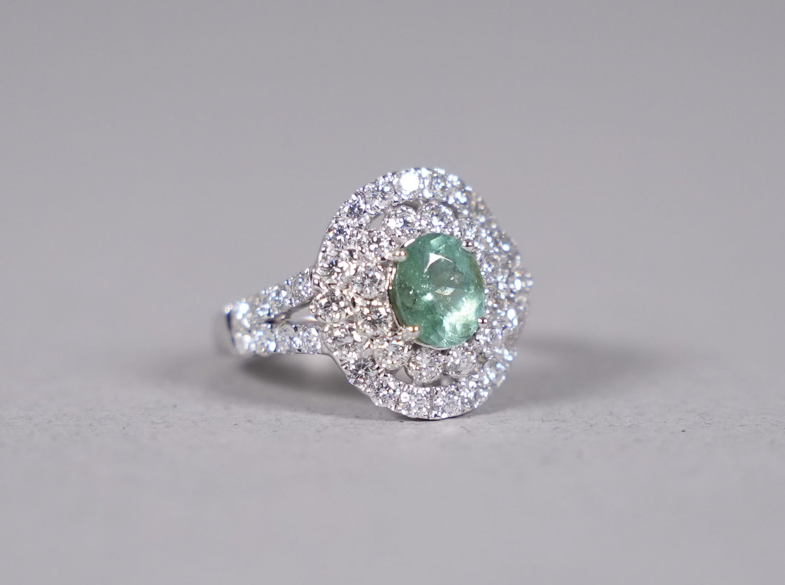Platinum natural Paraiba tourmaline diamond ring GIA: Platinum natural Paraiba tourmaline and diamond ring. Comes with GIA certificate. Total 0.93 carats natural tourmaline and total 1.32 carats natural diamonds. US ring size 6.3.