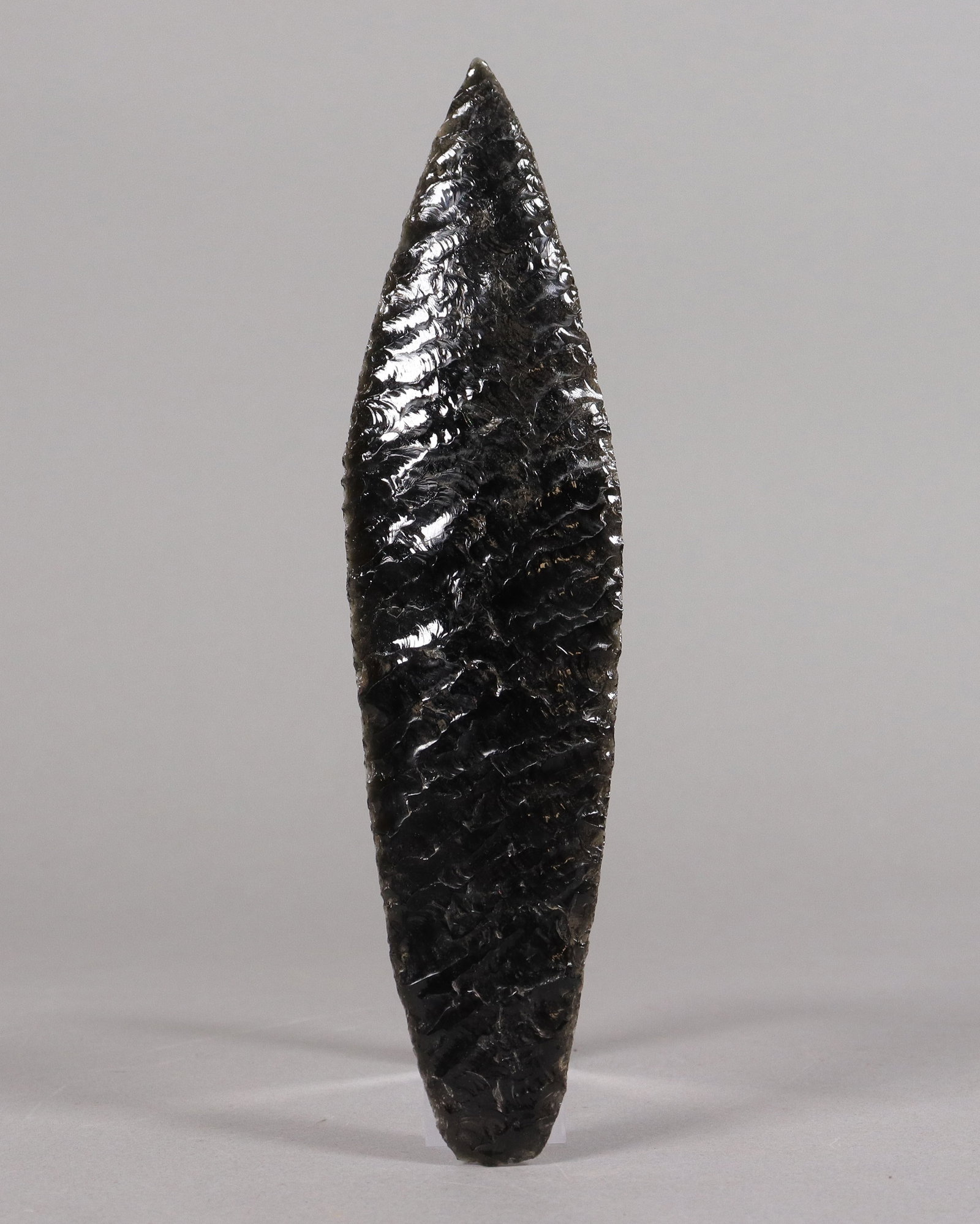 Pre-Columbian obsidian large spear: Pre-Columbian obsidian large spear. From an estate. H: 7" x W: 2."