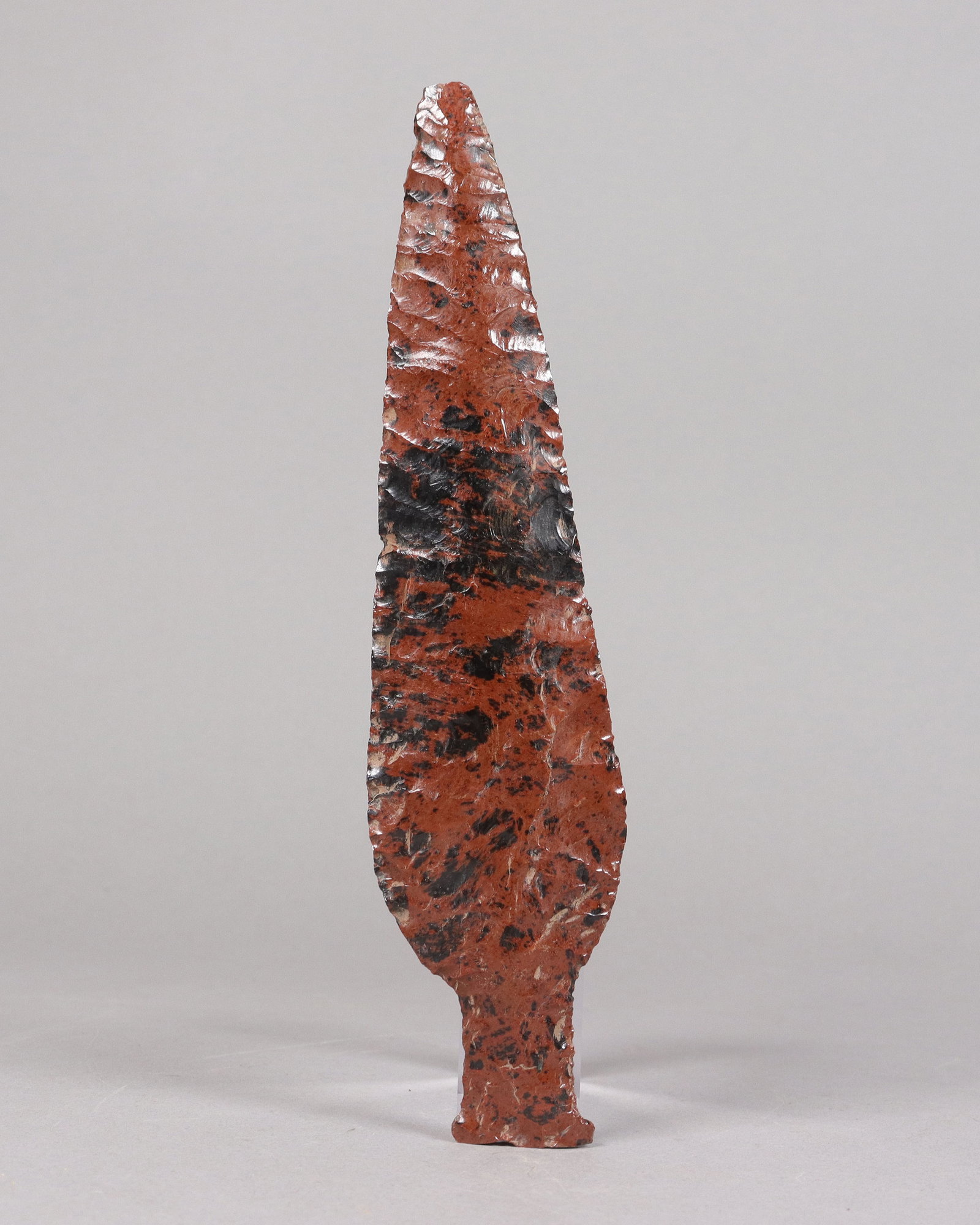 Pre-Columbian obsidian fine spear: Pre-Columbian obsidian large spear. From an estate. H: 8.25" x W: 2."