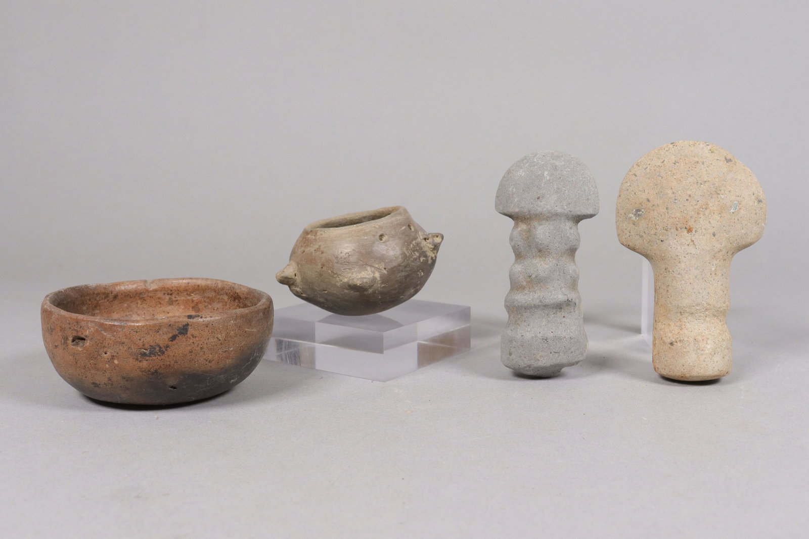 Lots Pre-Columbian tool and pot: Lots Pre-Columbian carved tool and pot.