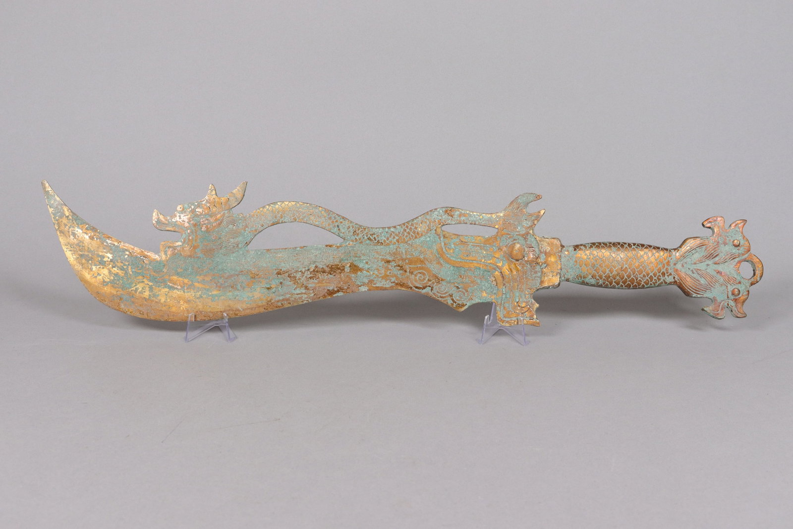 Chinese fine gilted bronze sword: Chinese fine gilted bronze sword. L: 27.25" x W: 4.75."