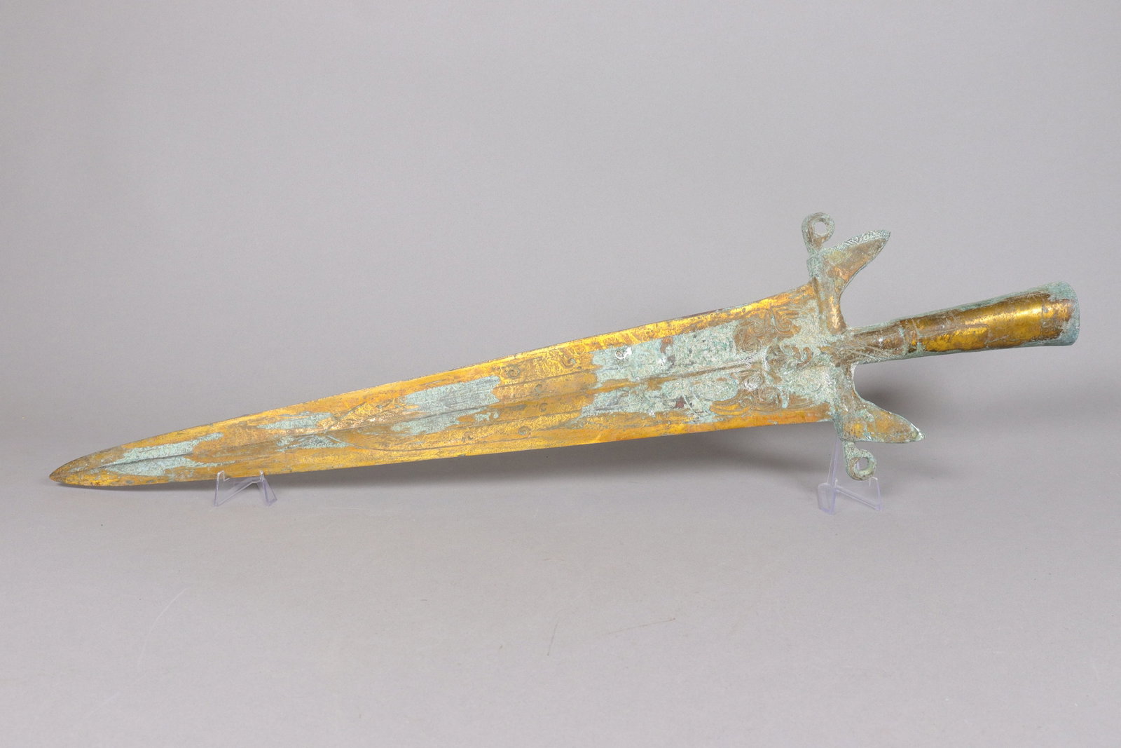 Chinese fine gilted bronze sword: Chinese fine gilted bronze sword. L: 28" x W: 7."