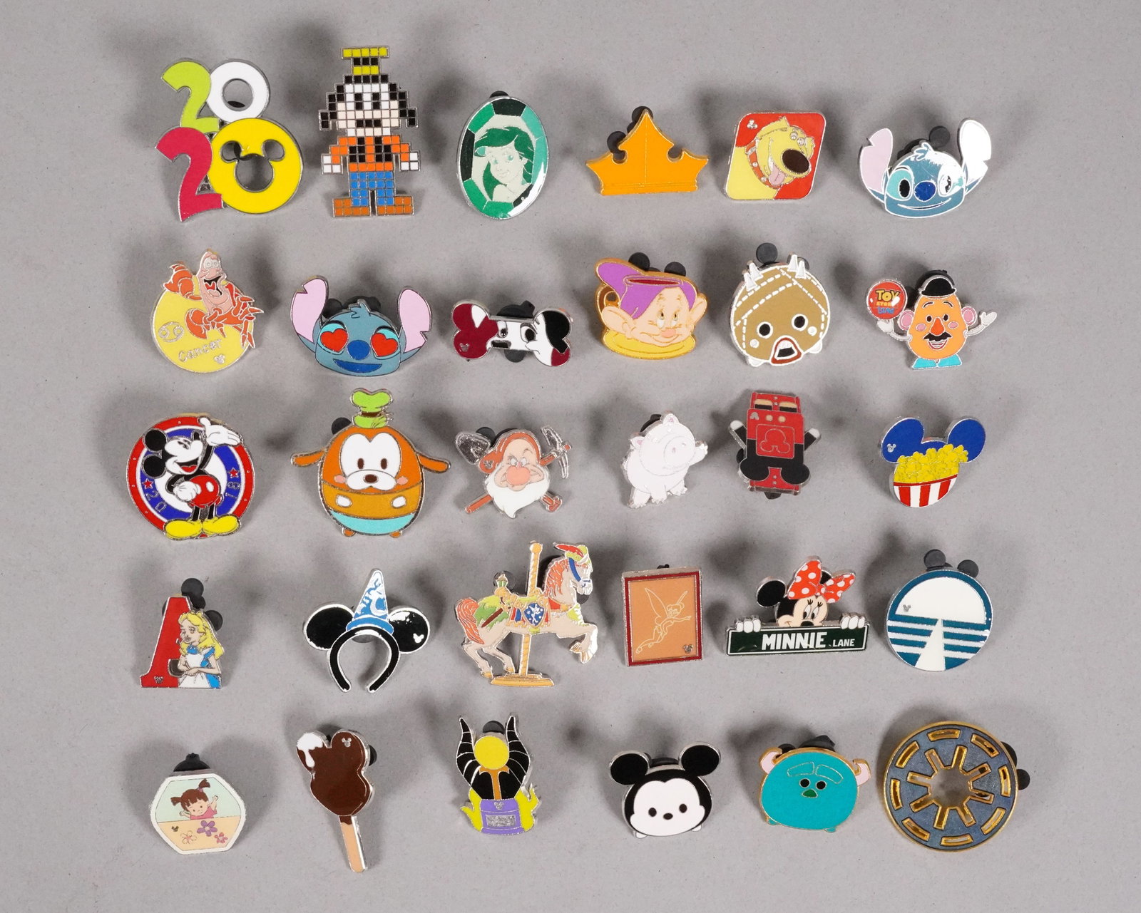 Lots Disney pins: Lots Disney pins.